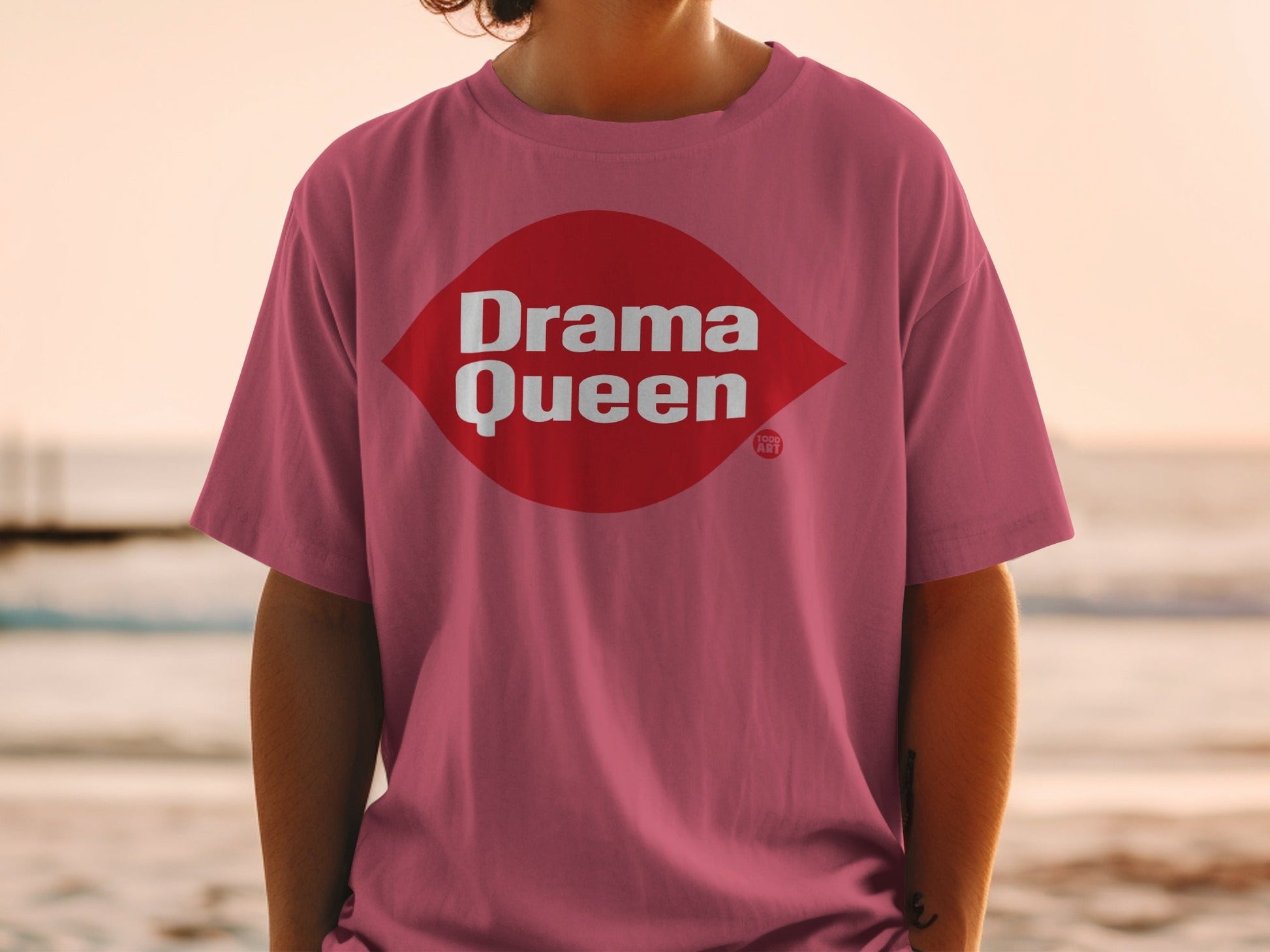 Rose t-shirt with red "Drama Queen" diamond logo on chest.