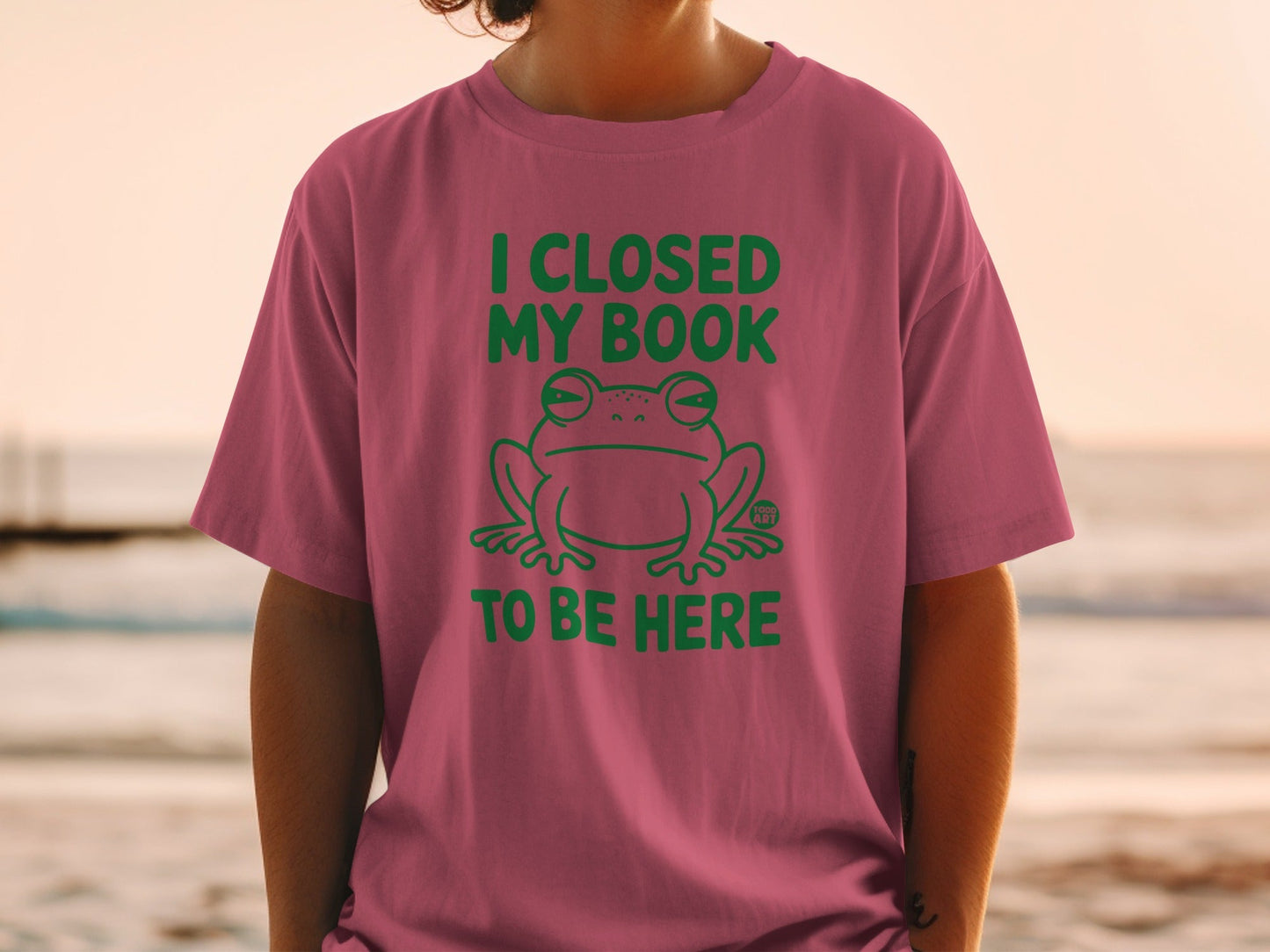 I Closed My Book To Be Here Frog Graphic T-Shirt