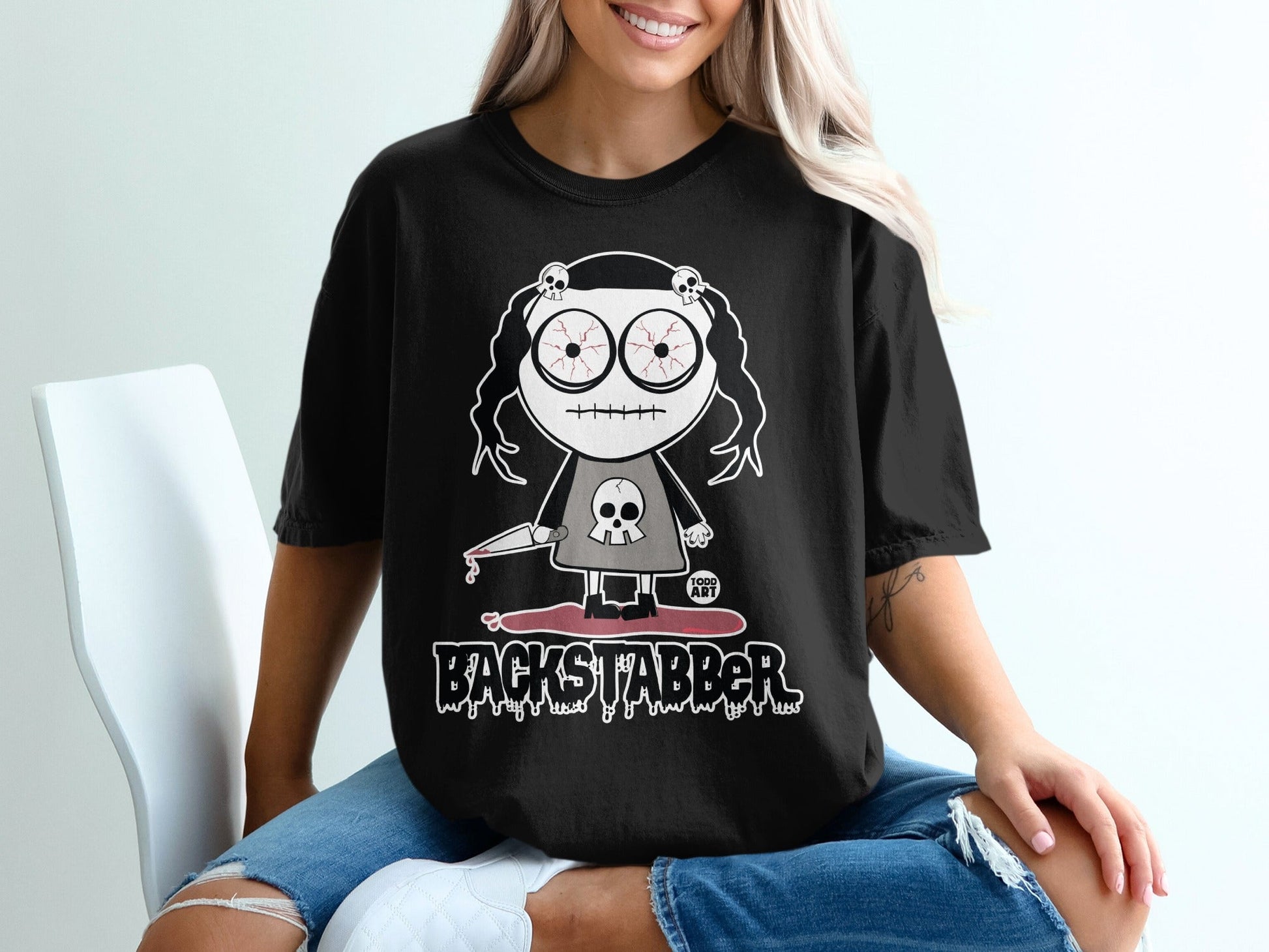 Quirky Backstabber Cartoon Graphic Black Shirt