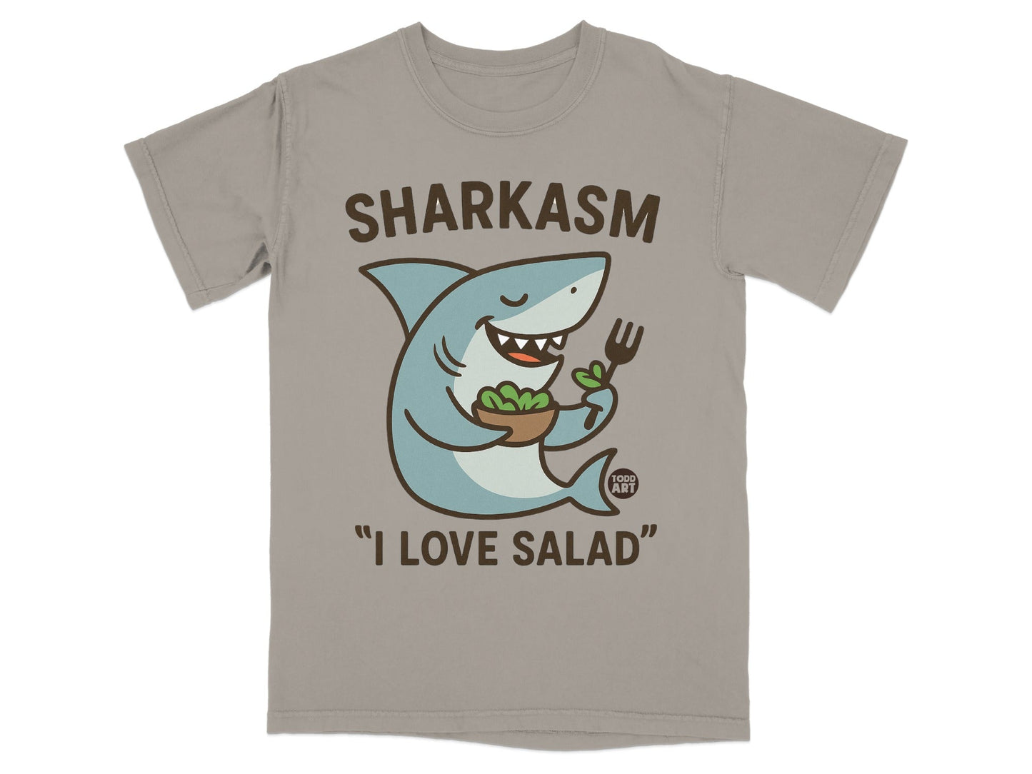 Grey t-shirt with cartoon shark holding salad bowl and fork, text reads "SHARKASM I LOVE SALAD".