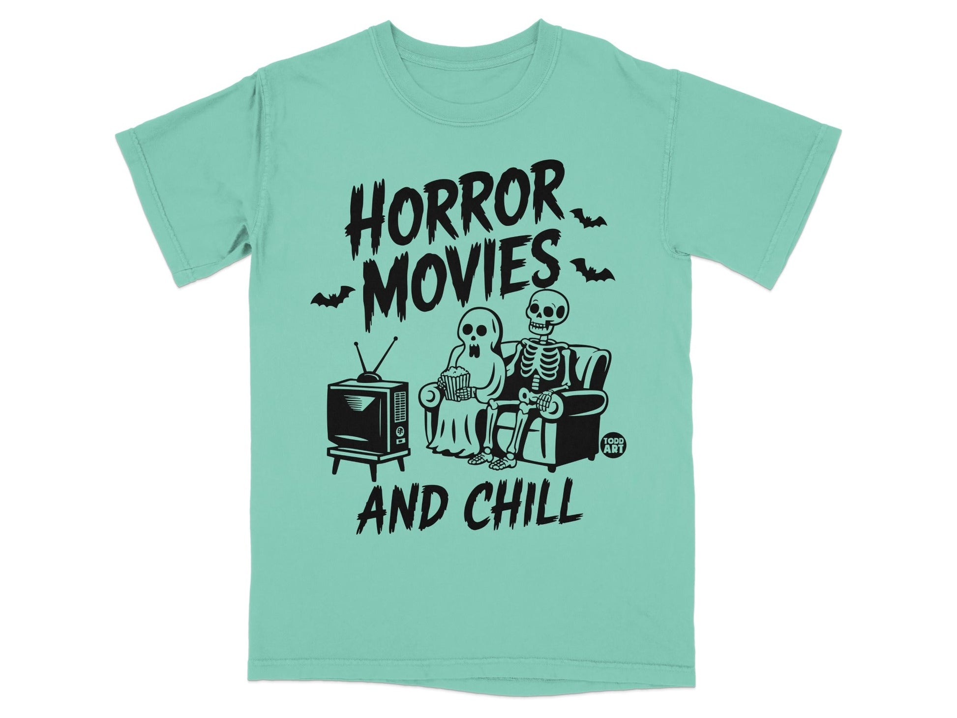 T-shirt with "Horror Movies and Chill" text, skeletons watching TV.