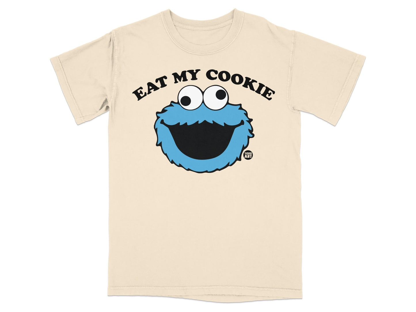 Cream t-shirt with "Eat My Cookie" text and Cookie Monster graphic.
