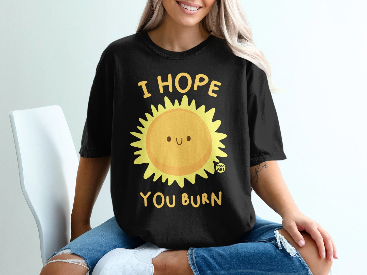 Black t-shirt with smiling sun graphic and text "I HOPE YOU BURN".