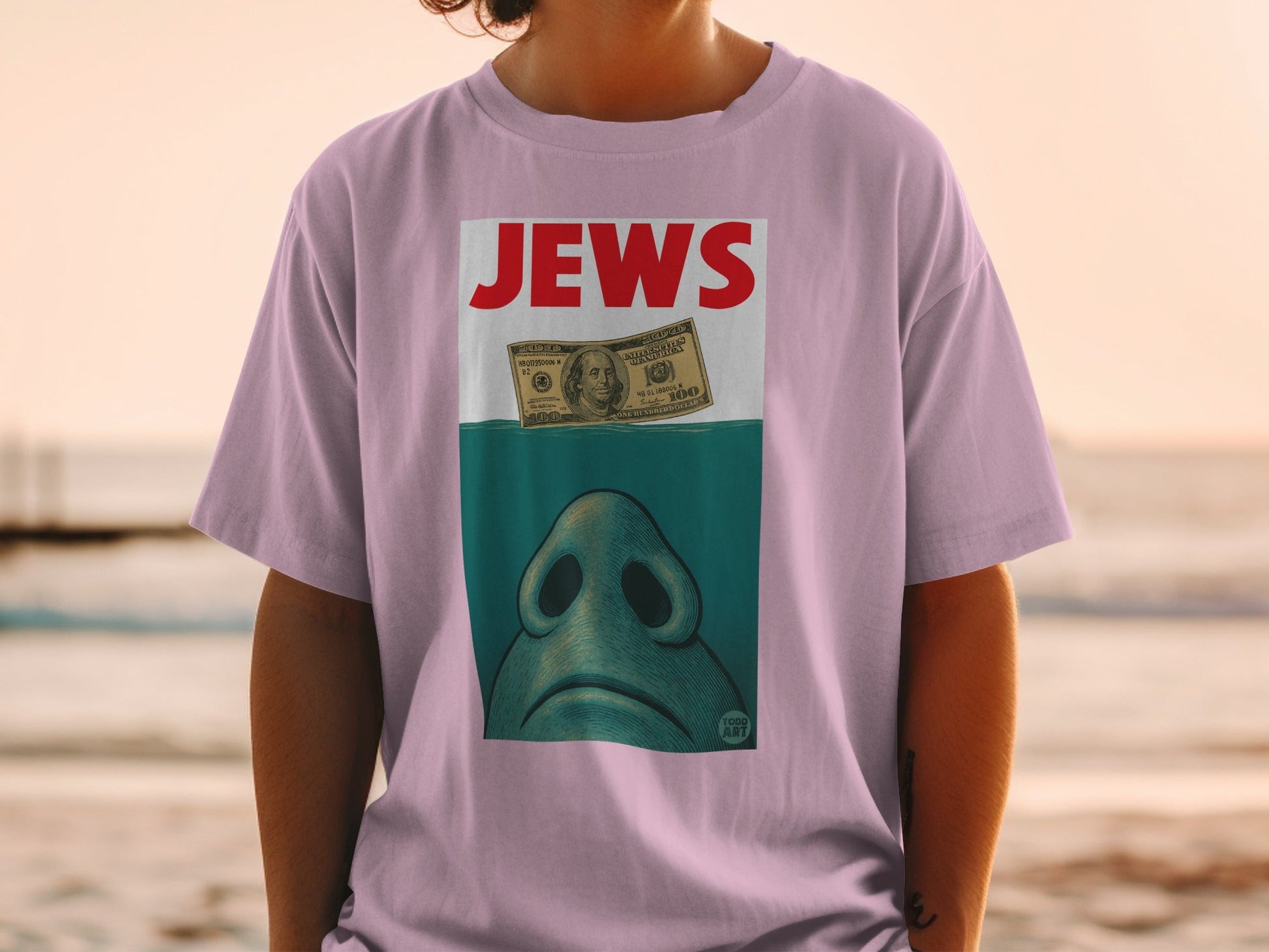T-shirt with "JEWS" text above a shark fin and a $100 bill.