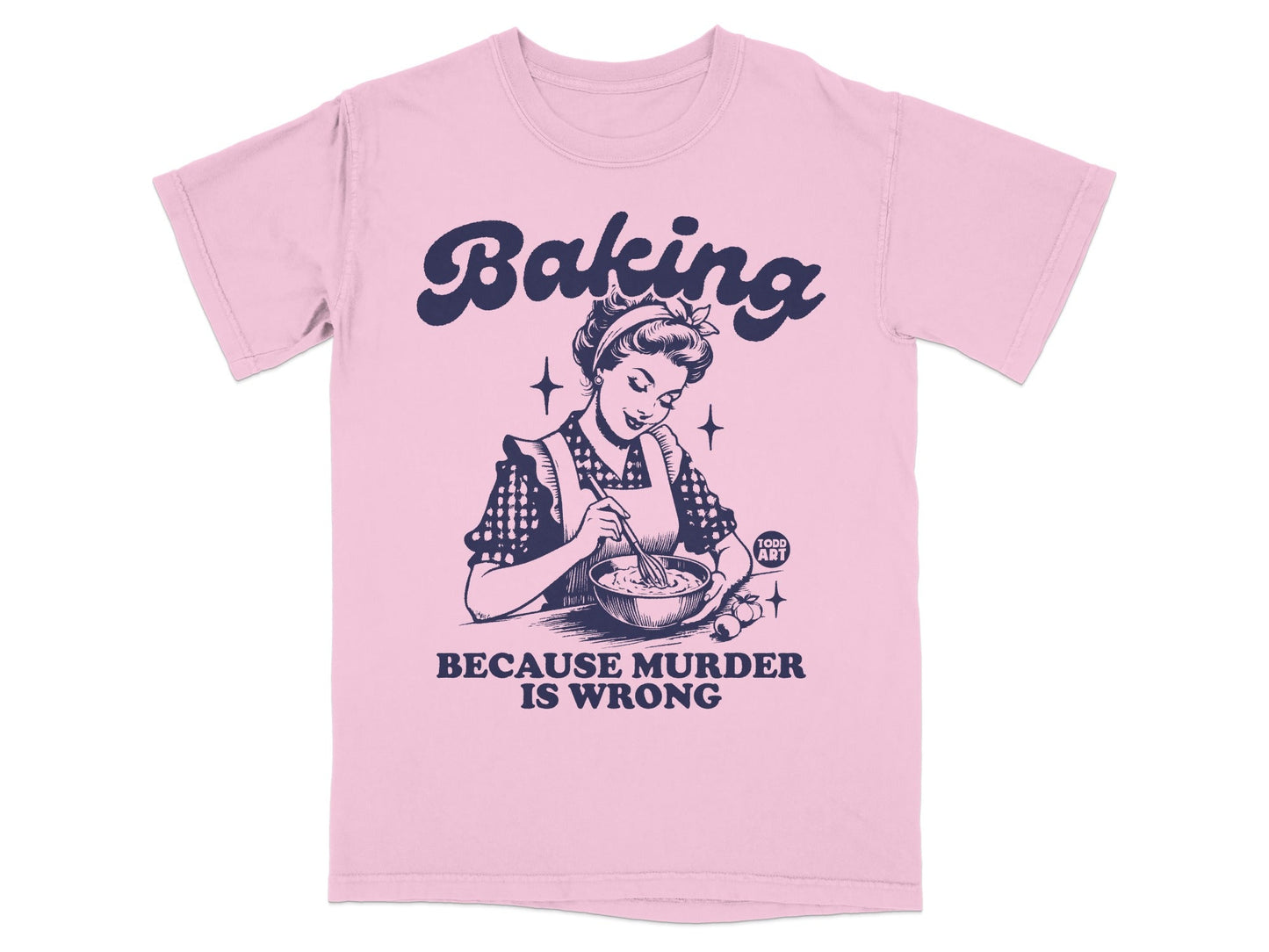 Pink t-shirt with woman baking and text "Baking Because Murder Is Wrong".