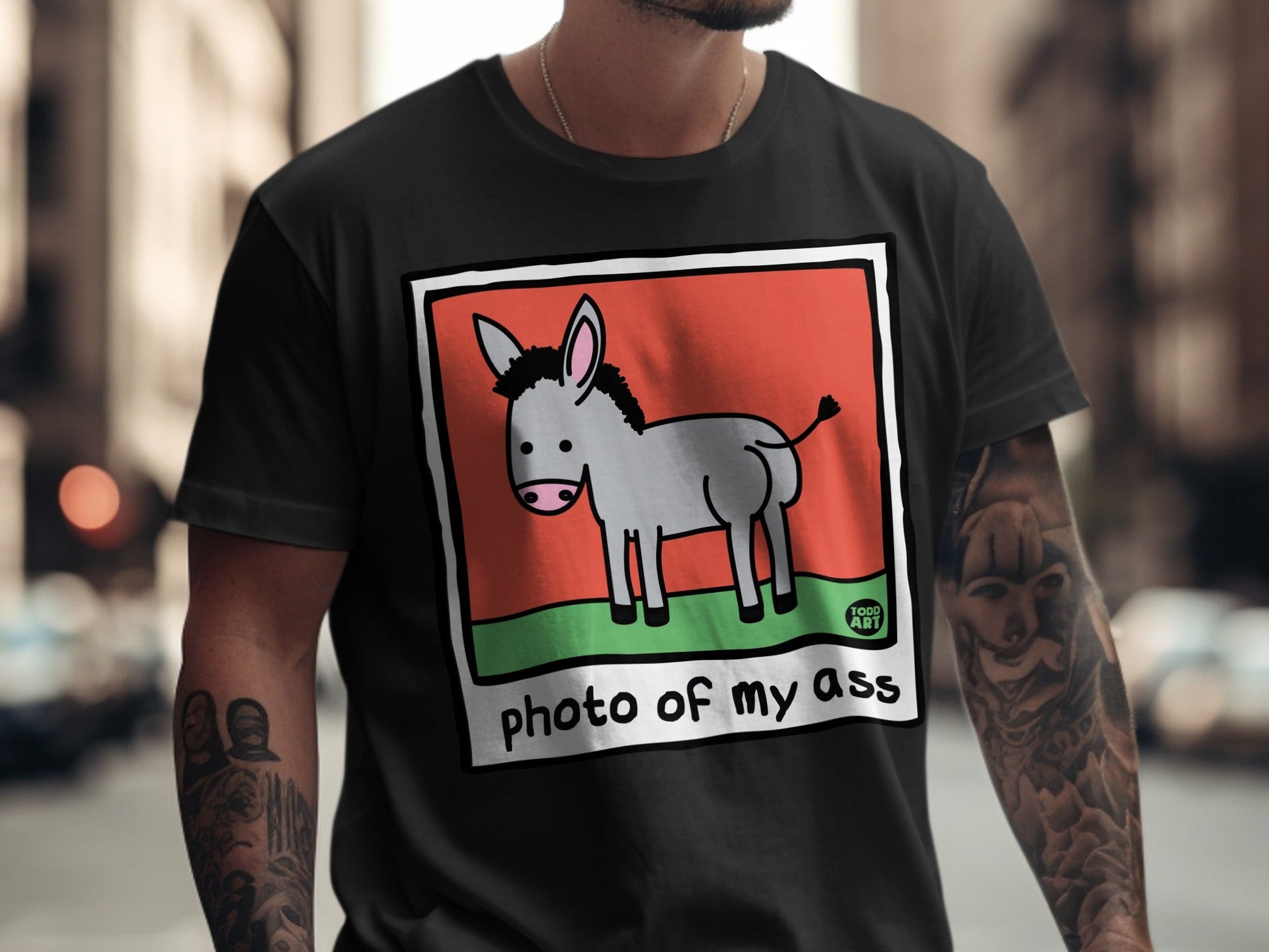 T-shirt with cartoon donkey illustration and text "photo of my ass".