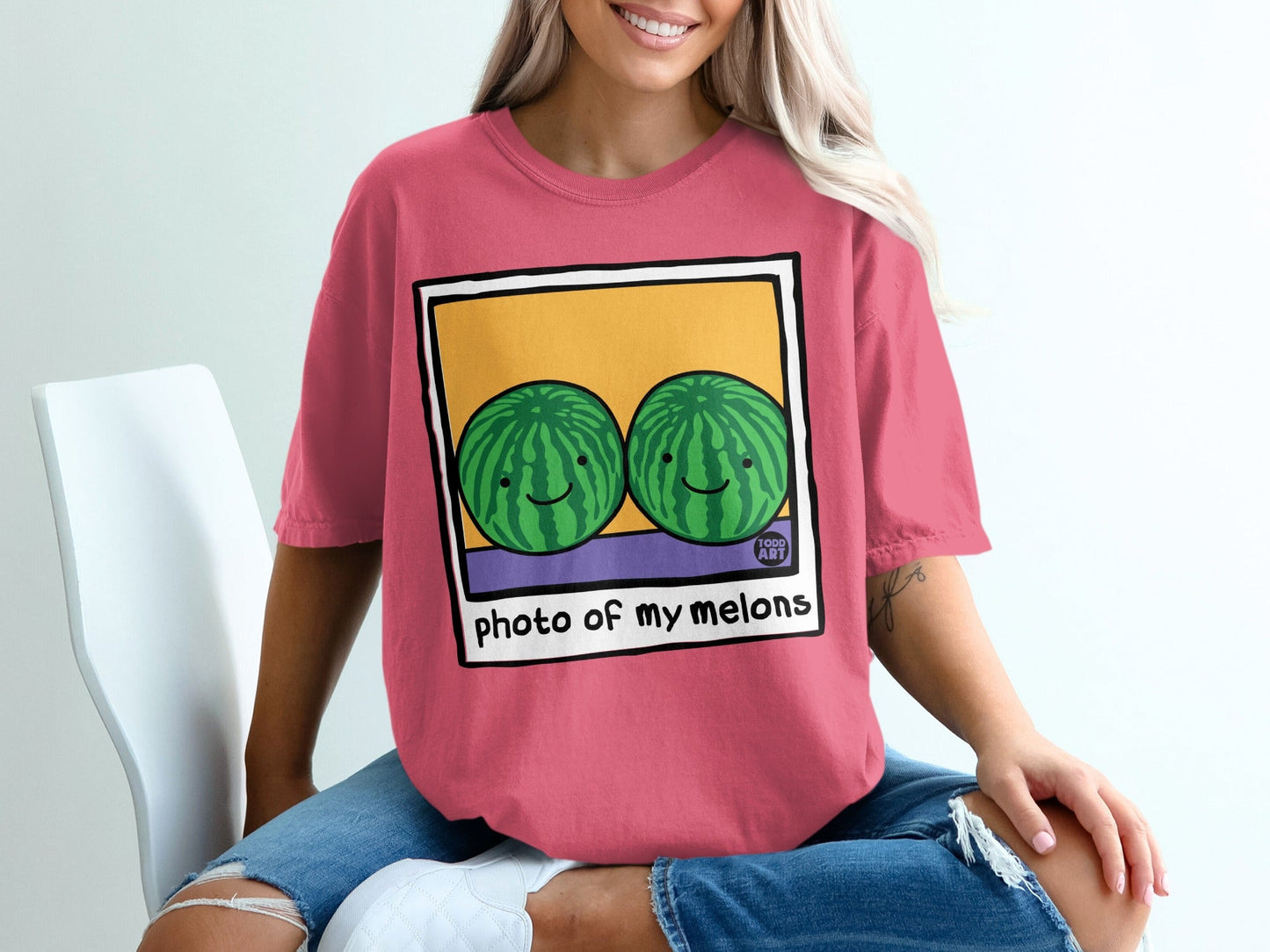 Pink t-shirt with cartoon watermelons and "photo of my melons" text.
