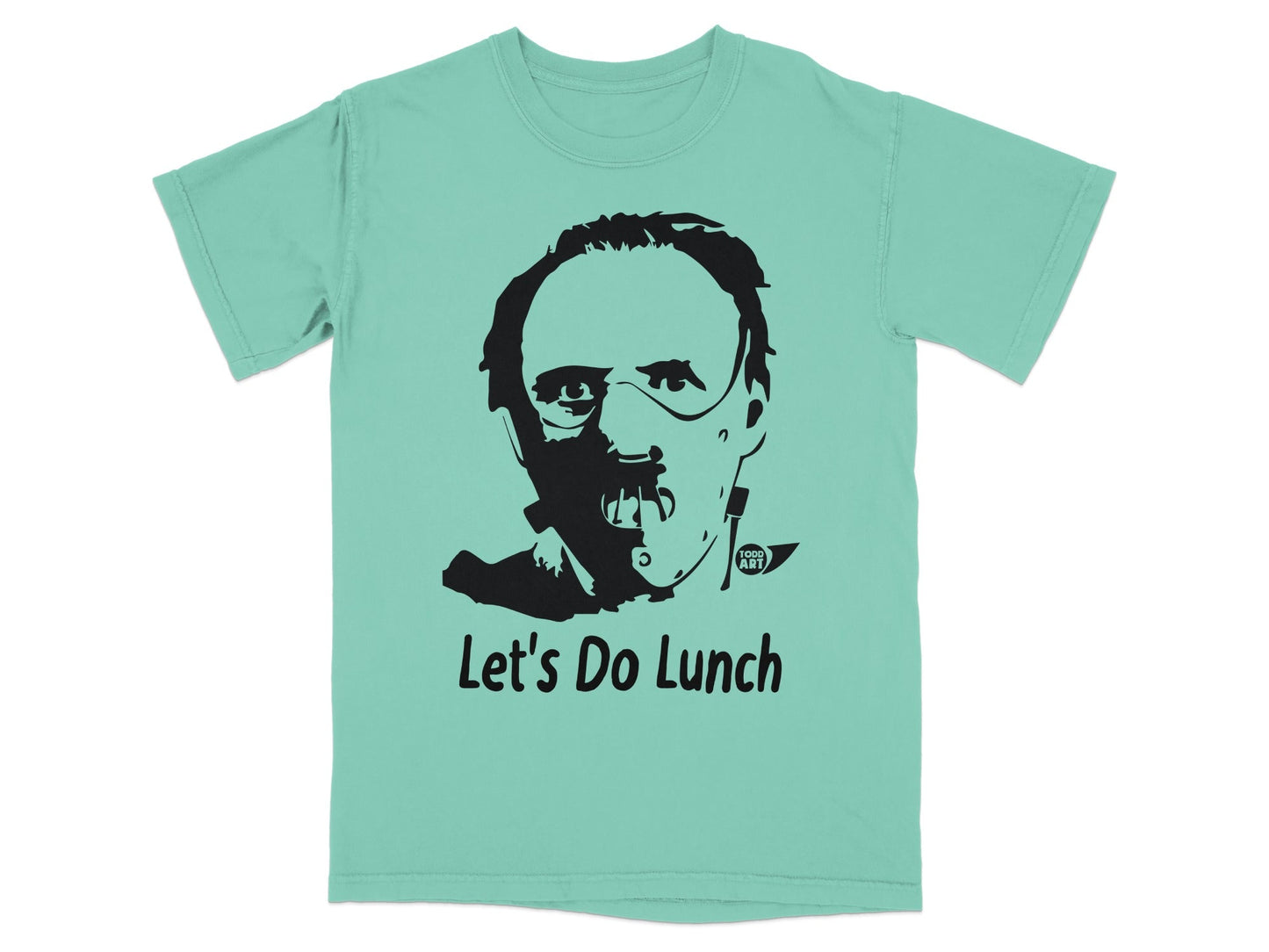 Teal t-shirt featuring a black graphic of Hannibal Lecter's mask and the text "Let's Do Lunch".
