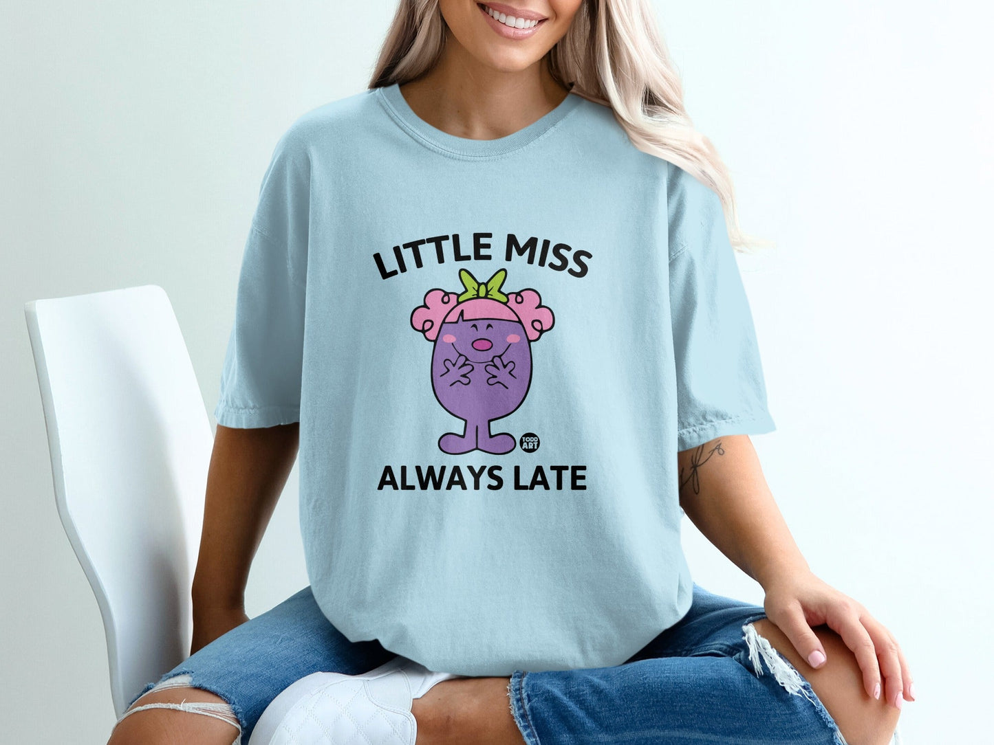 Light blue t-shirt with "Little Miss Always Late" graphic.