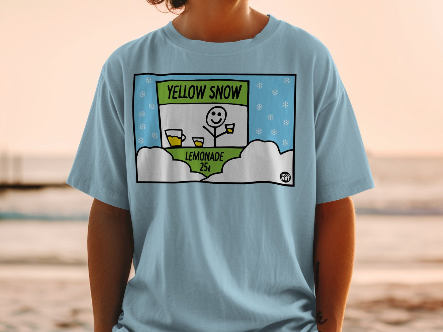 Light blue t-shirt with a cartoon of a snowman selling lemonade for 25 cents.