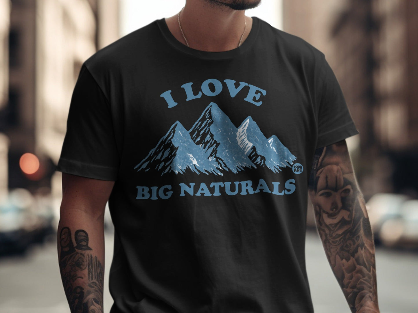 Black t-shirt with "I Love Big Naturals" and mountain graphic.