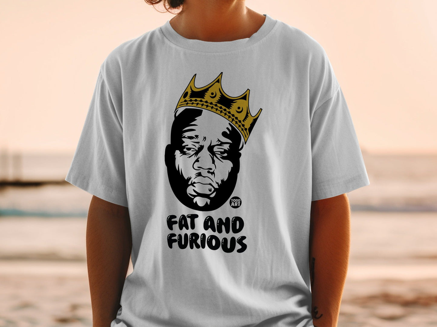 White t-shirt with Biggie Smalls graphic wearing a crown and text "FAT AND FURIOUS".