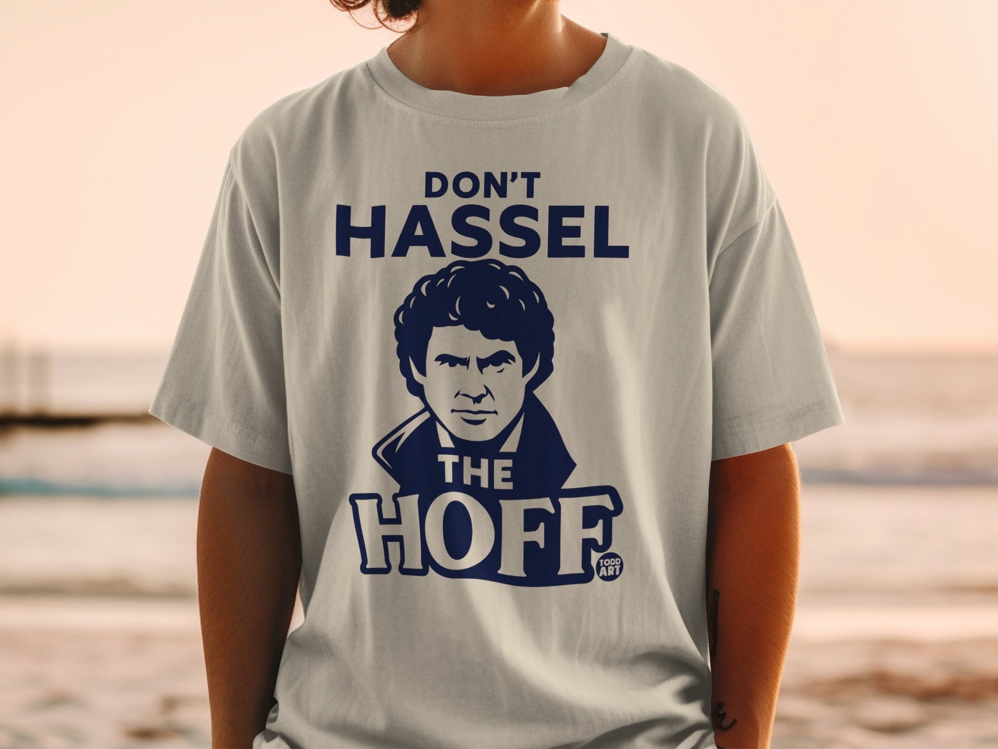 T-shirt featuring "Don't Hassel The Hoff" graphic with actor David Hasselhoff.
