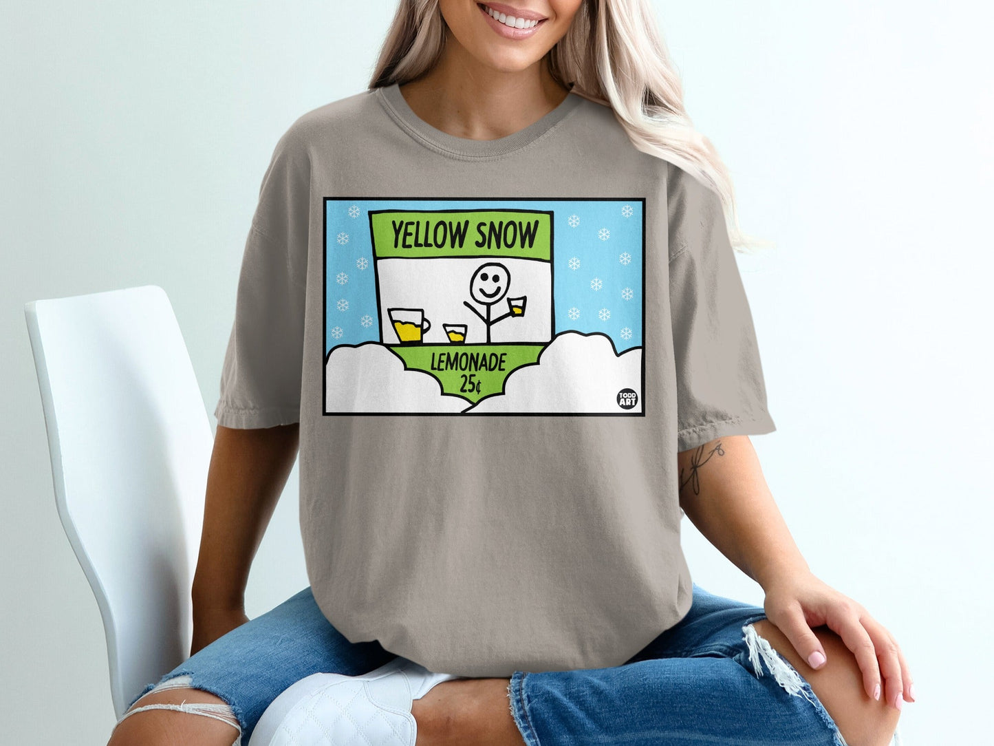 Cartoon of a lemonade stand with "Yellow Snow Lemonade 25¬¢" sign.