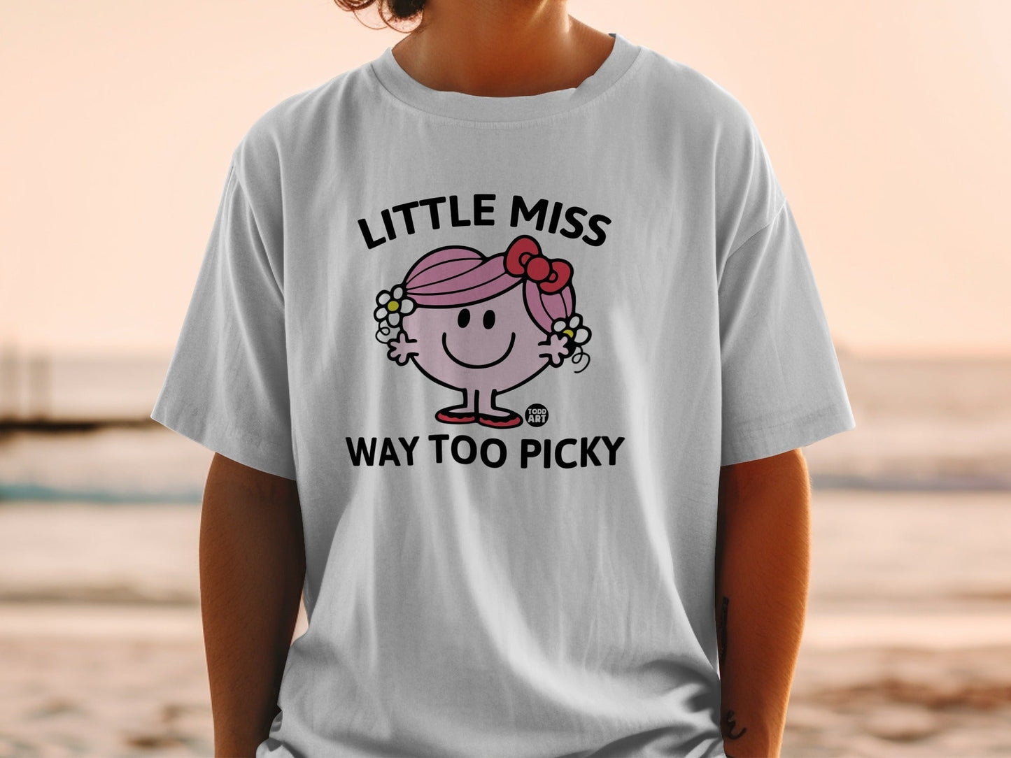 White t-shirt with "Little Miss Way Too Picky" graphic featuring a character with a bow.