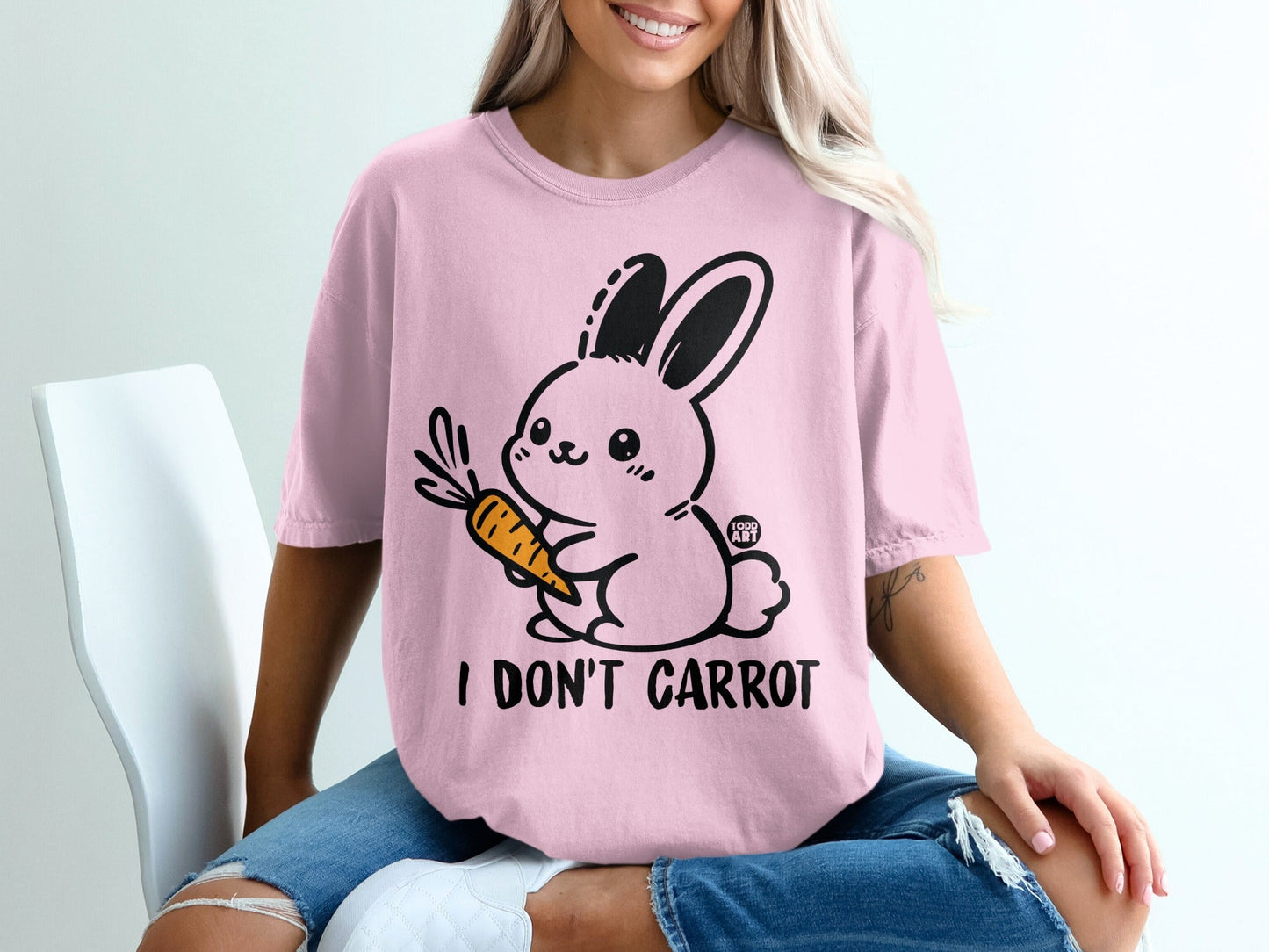 Pink T-Shirt with Cute Bunny Holding Carrot Design