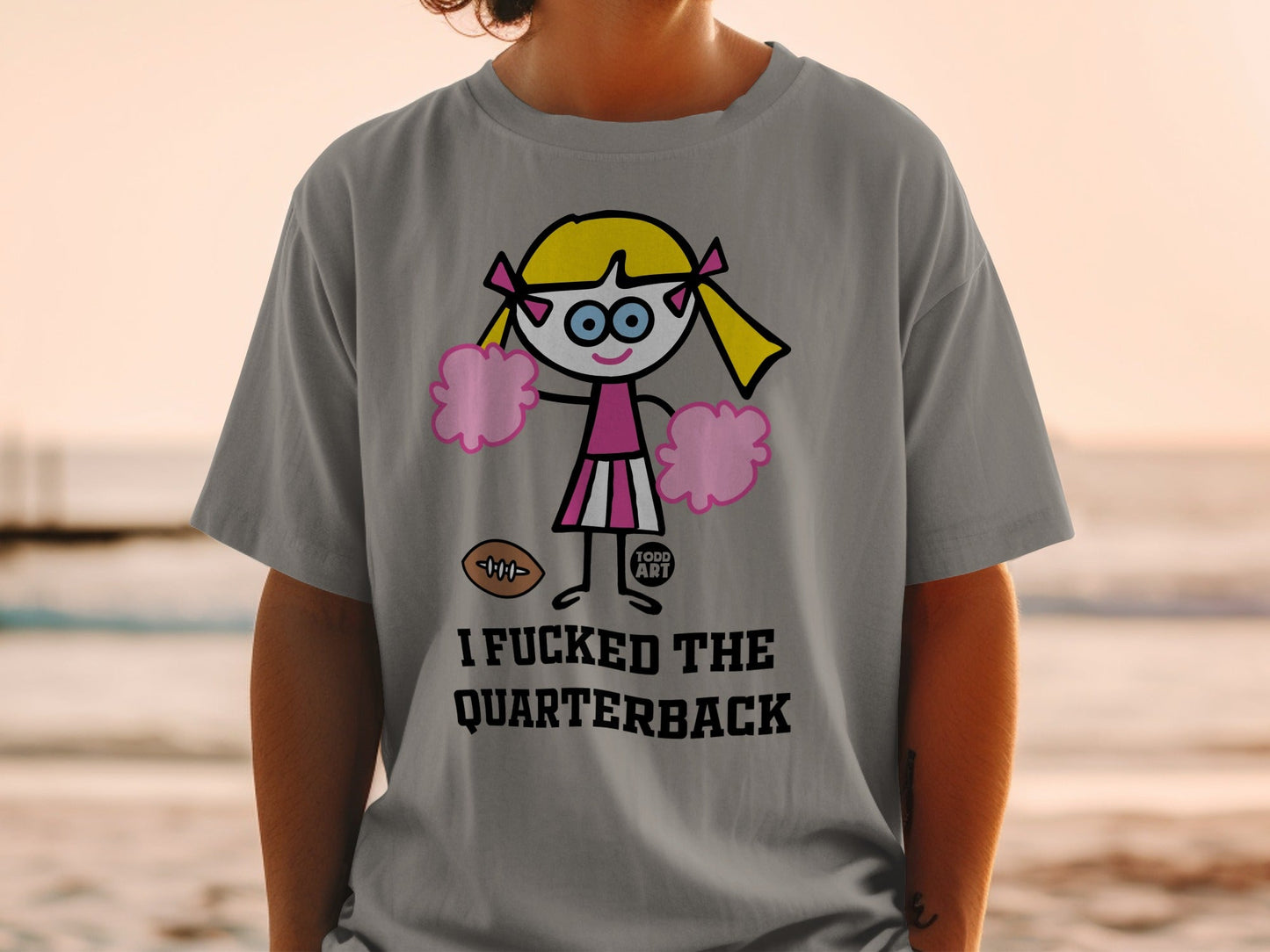 Humorous Cheerleader and Quarterback Graphic Shirt