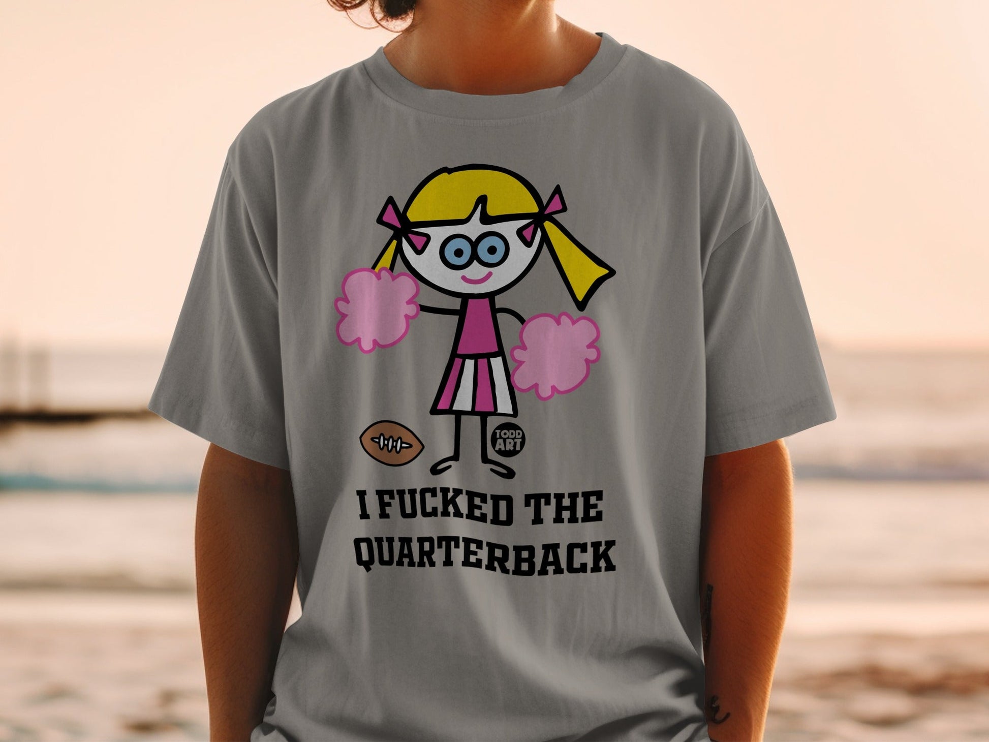 Humorous Cheerleader and Quarterback Graphic Shirt