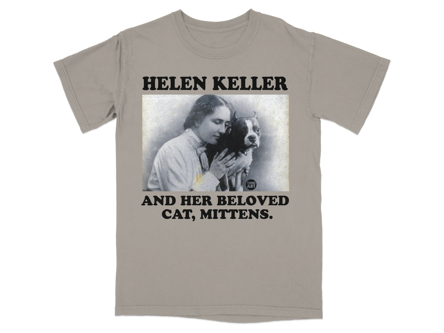 T-shirt with Helen Keller and her cat, Mittens, printed on it.