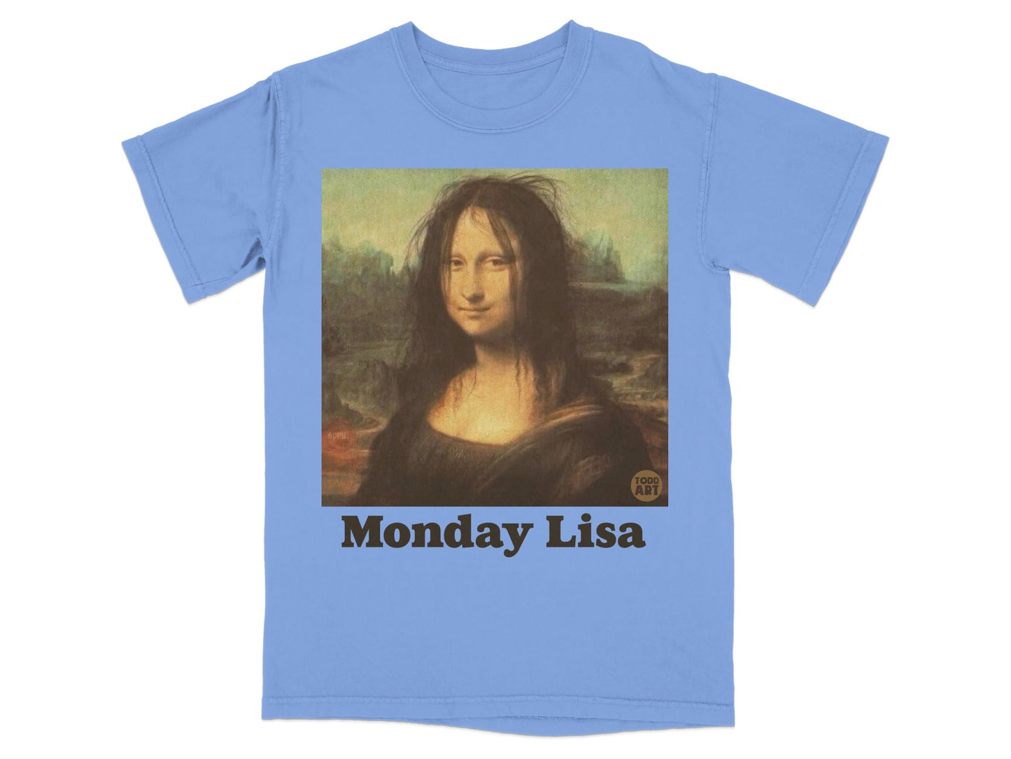 Blue t-shirt with a stylized Mona Lisa wearing messy hair, text "Monday Lisa".