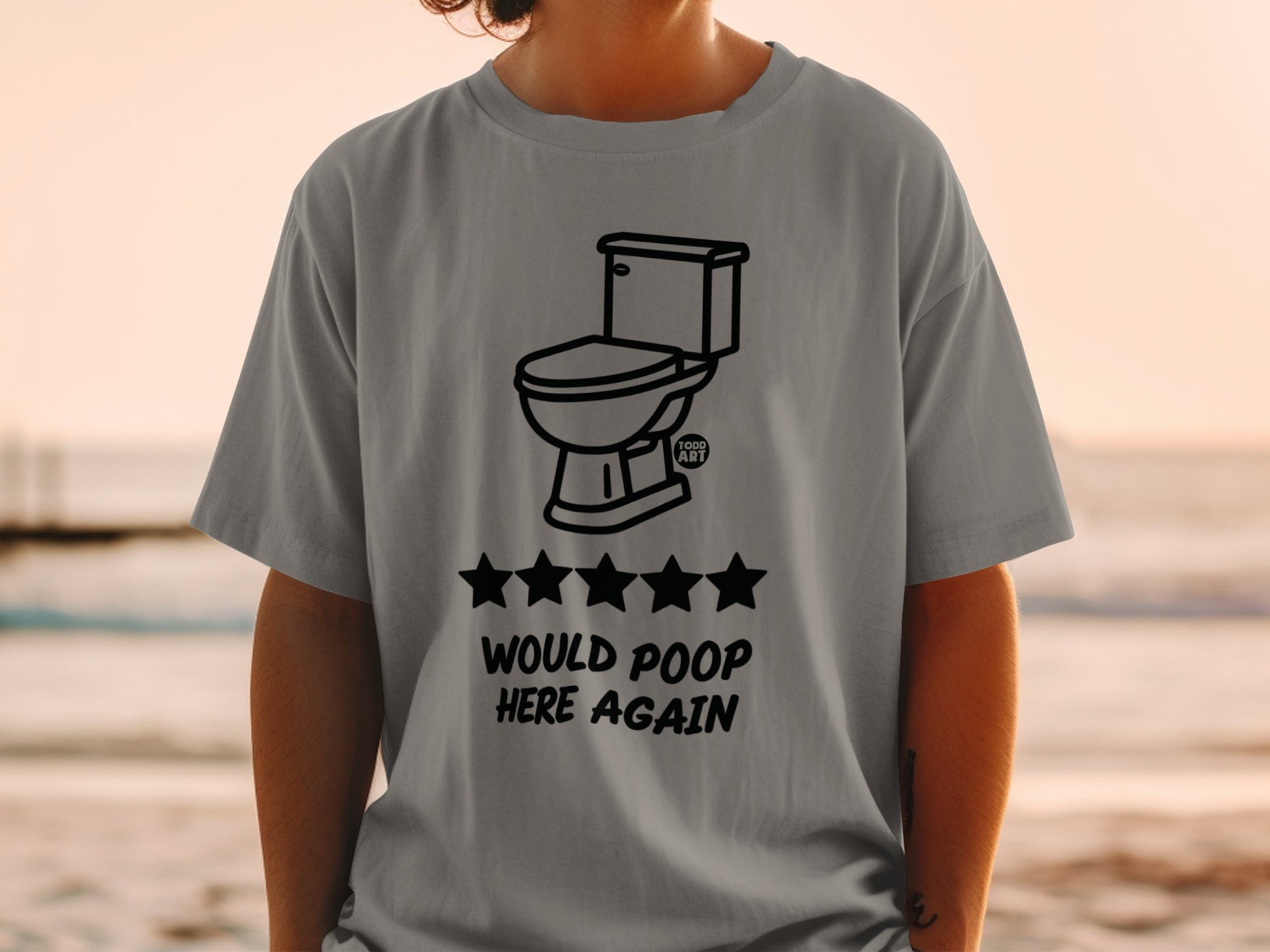 Gray t-shirt with toilet graphic and "Would Poop Here Again" text.