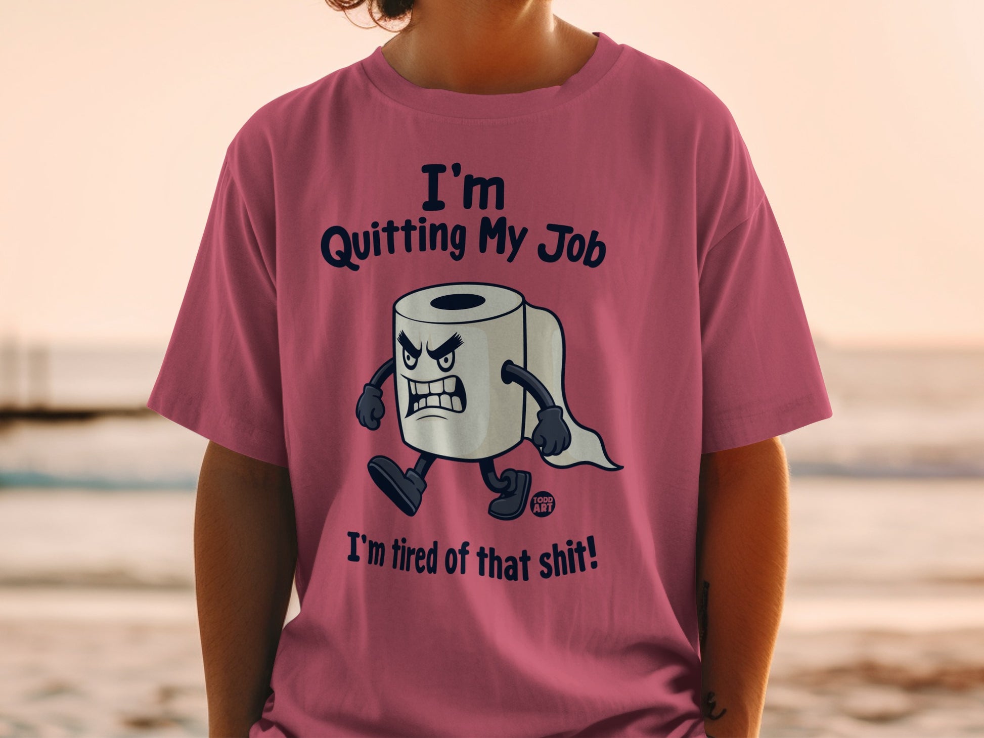 Pink t-shirt with cartoon toilet paper roll saying "I'm Quitting My Job! I'm tired of that shit!"