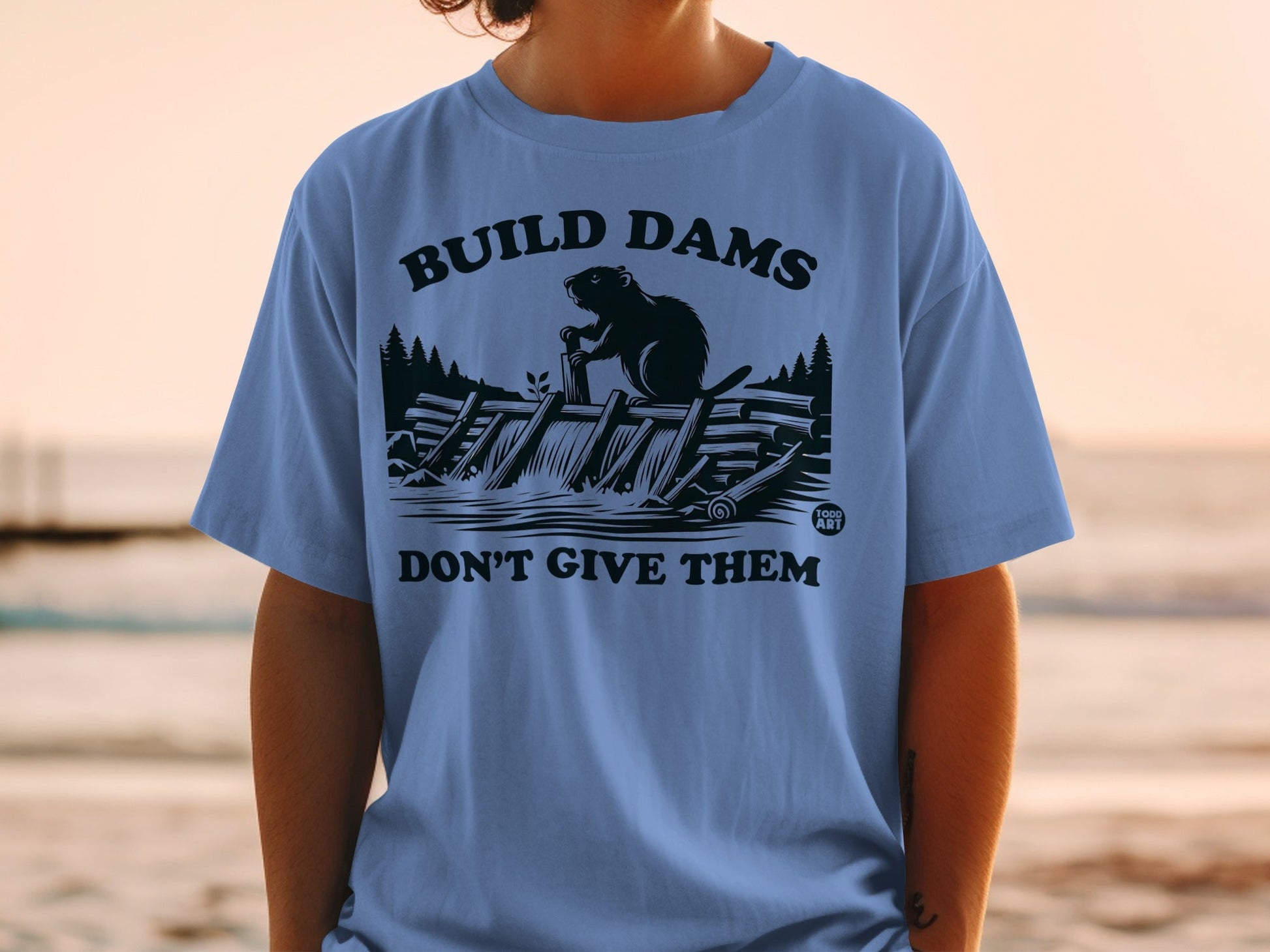Build Dams Don't Give Them Graphic T-Shirt