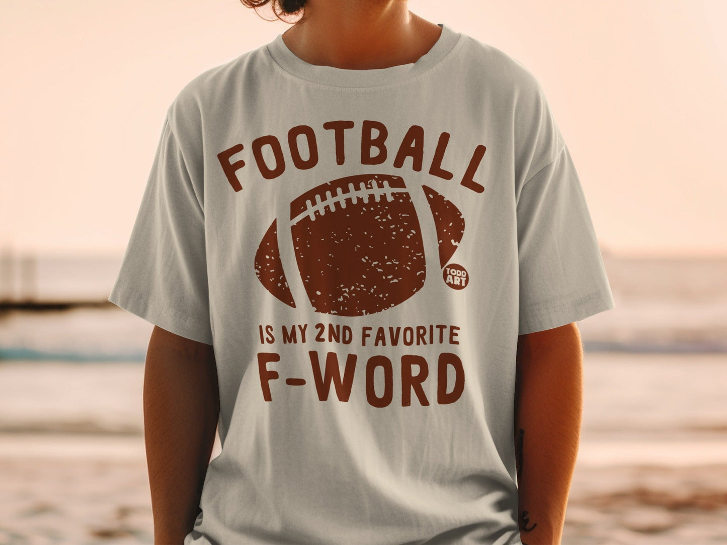 T-shirt with "FOOTBALL IS MY 2ND FAVORITE F-WORD" and football graphic.
