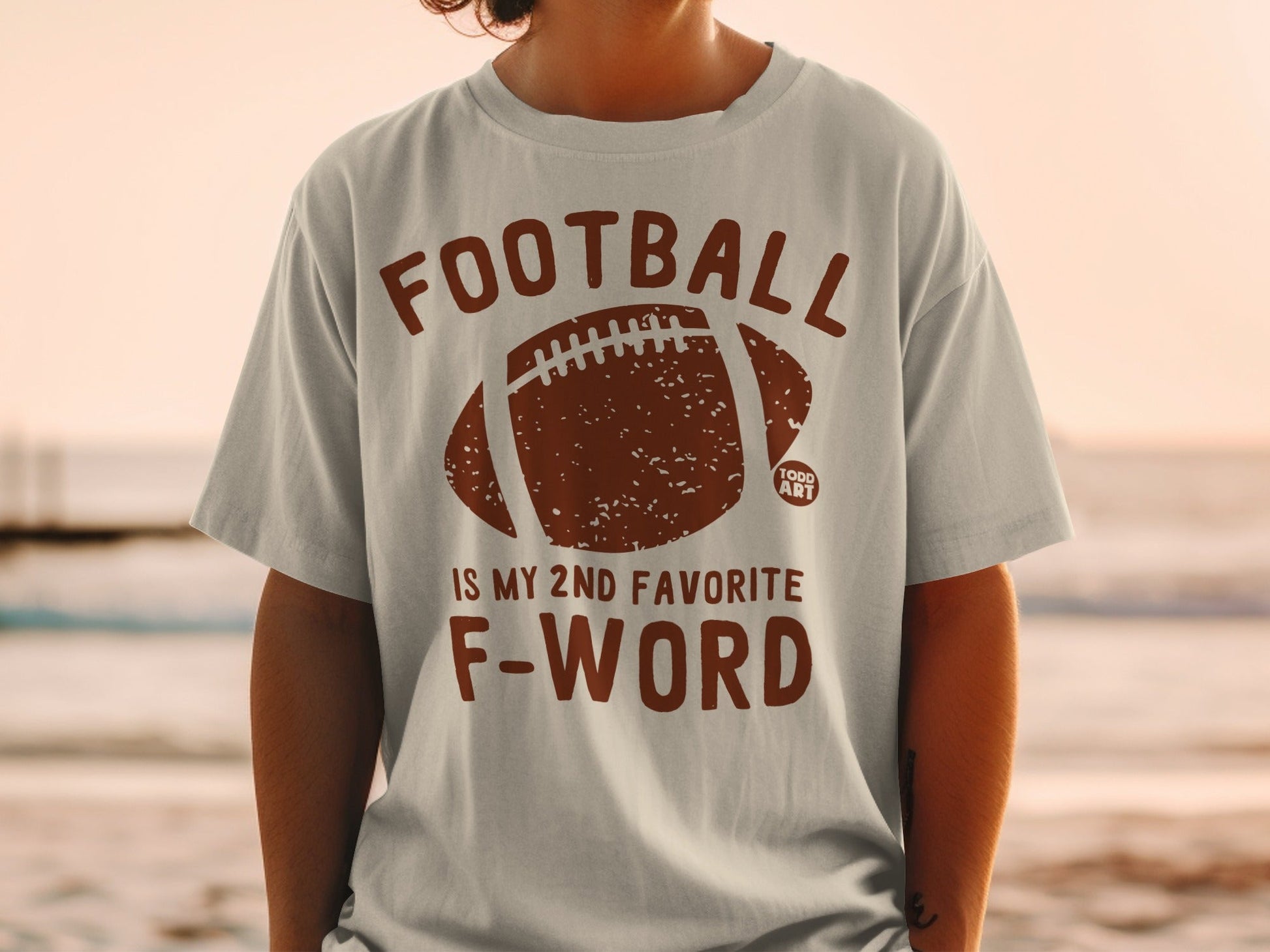 T-shirt with "FOOTBALL IS MY 2ND FAVORITE F-WORD" and football graphic.