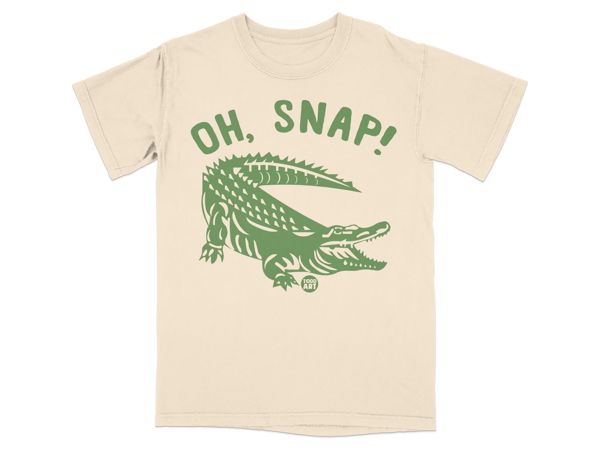 Cream t-shirt with green alligator graphic and "OH, SNAP!" text.