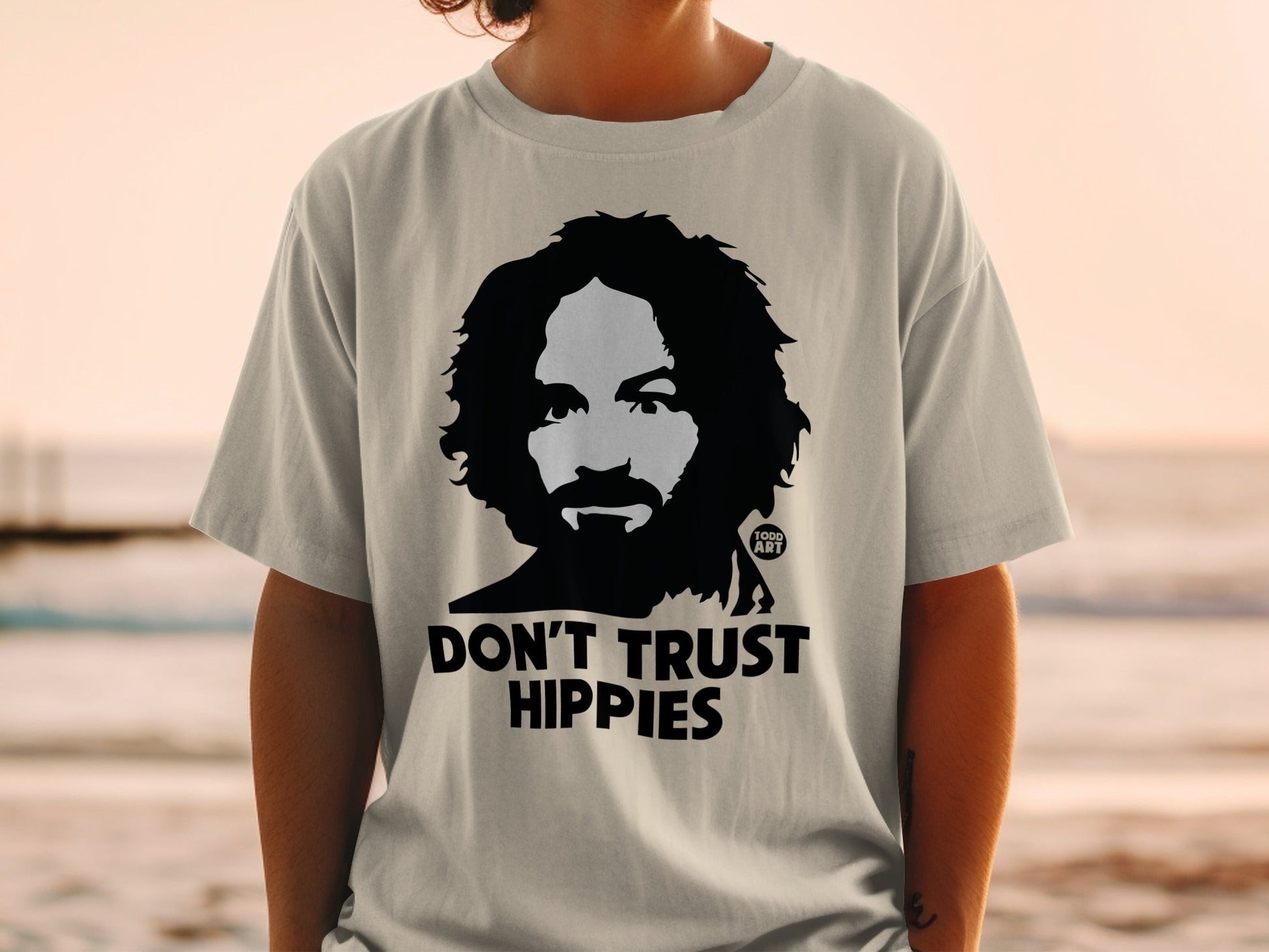 T-shirt with a portrait of a man and the text "DON'T TRUST HIPPIES".