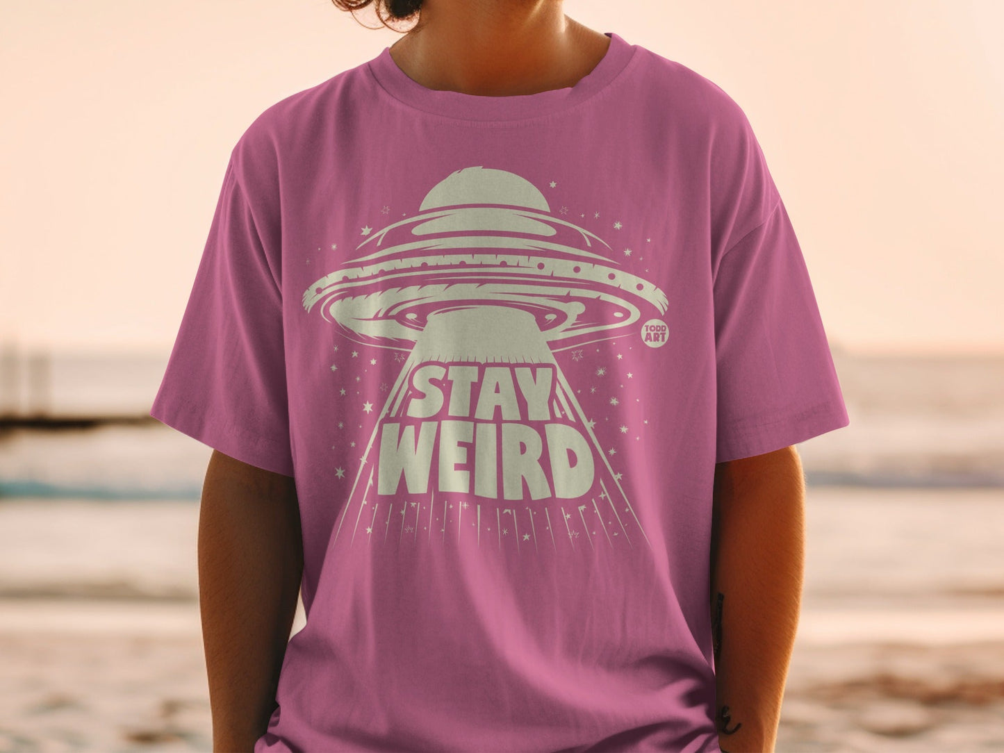 Unique Stay Weird Pink Graphic T-Shirt for All Ages