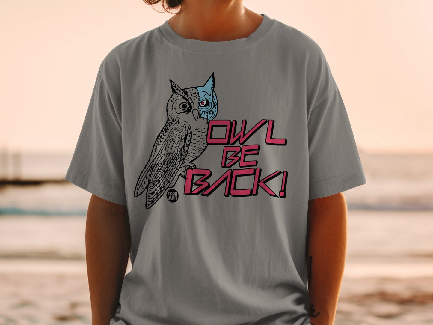 Grey t-shirt with "OWL BE BACK!" text and owl graphic.