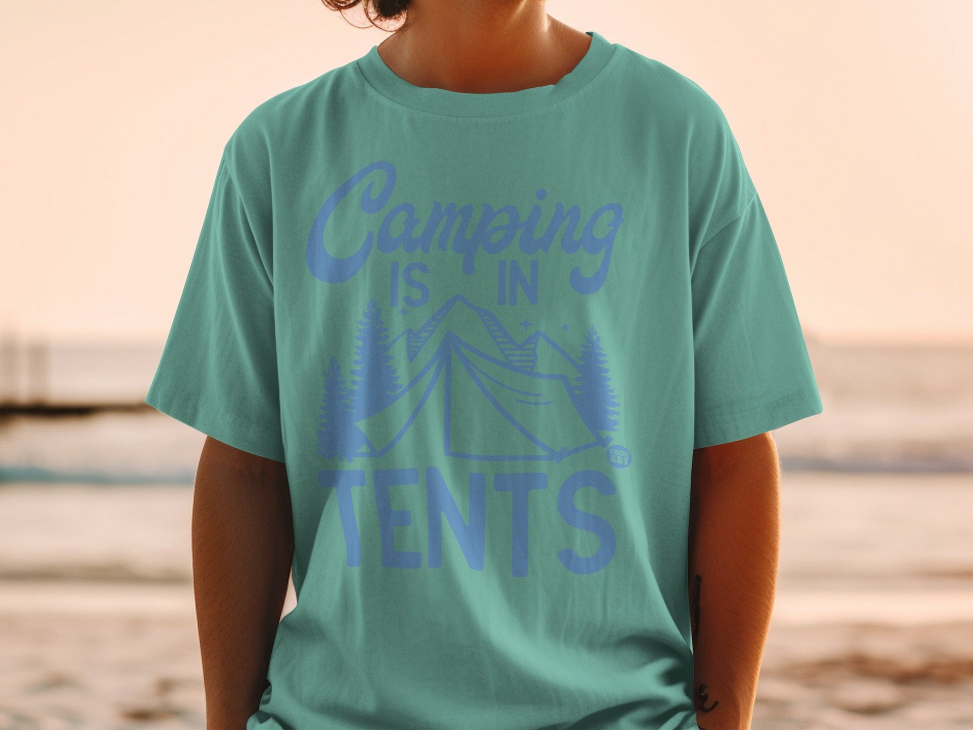 Teal t-shirt with "Camping is in TENTS" graphic featuring tents and mountains.