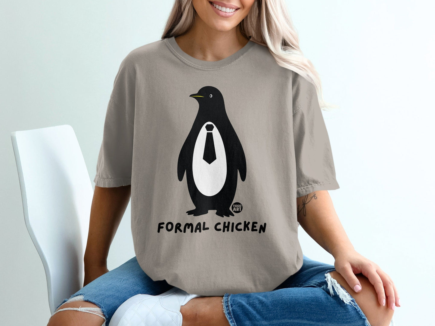 T-shirt with a penguin wearing a tie and the text "Formal Chicken".