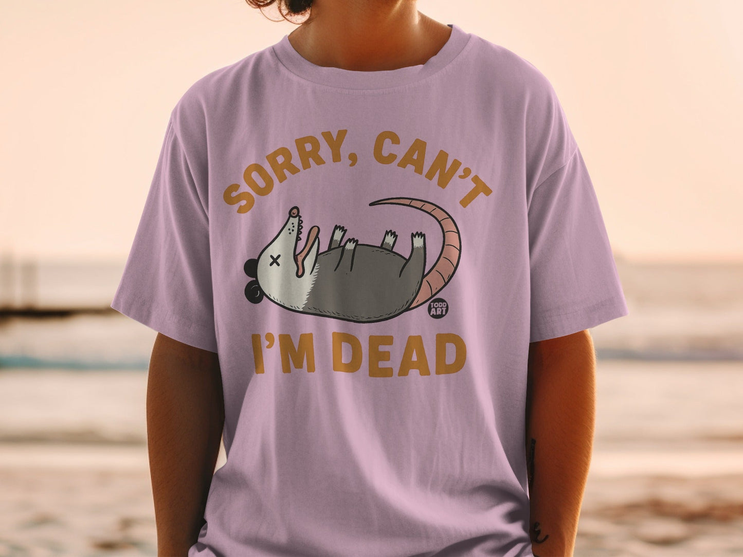 Opossum lying on its back with text "Sorry, can't I'm dead."