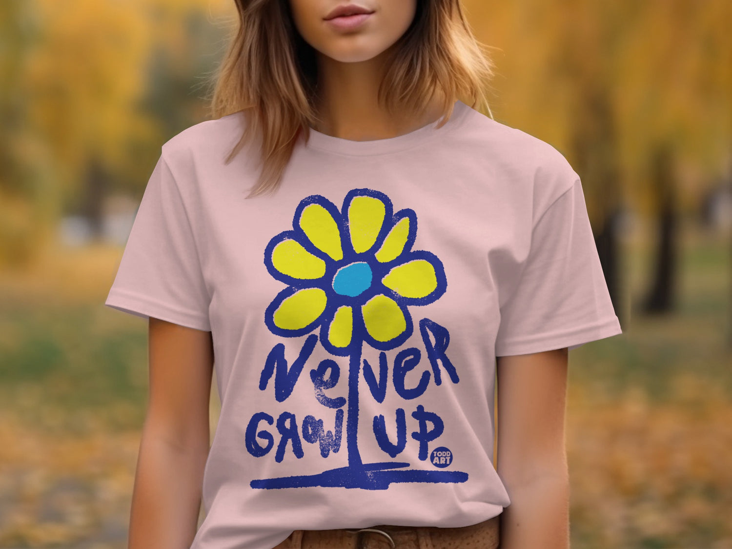 Never Grow Up Graphic Tee with Colorful Flower Design