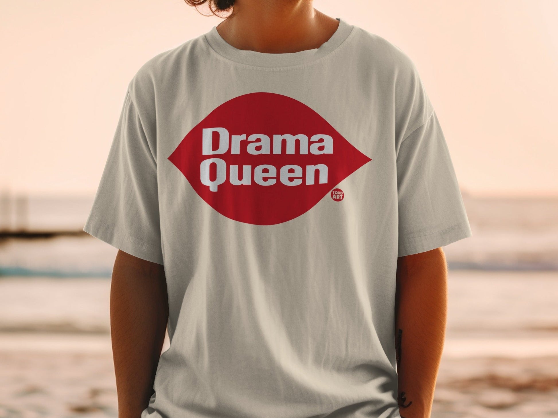 Grey t-shirt with red diamond logo and "Drama Queen" text.