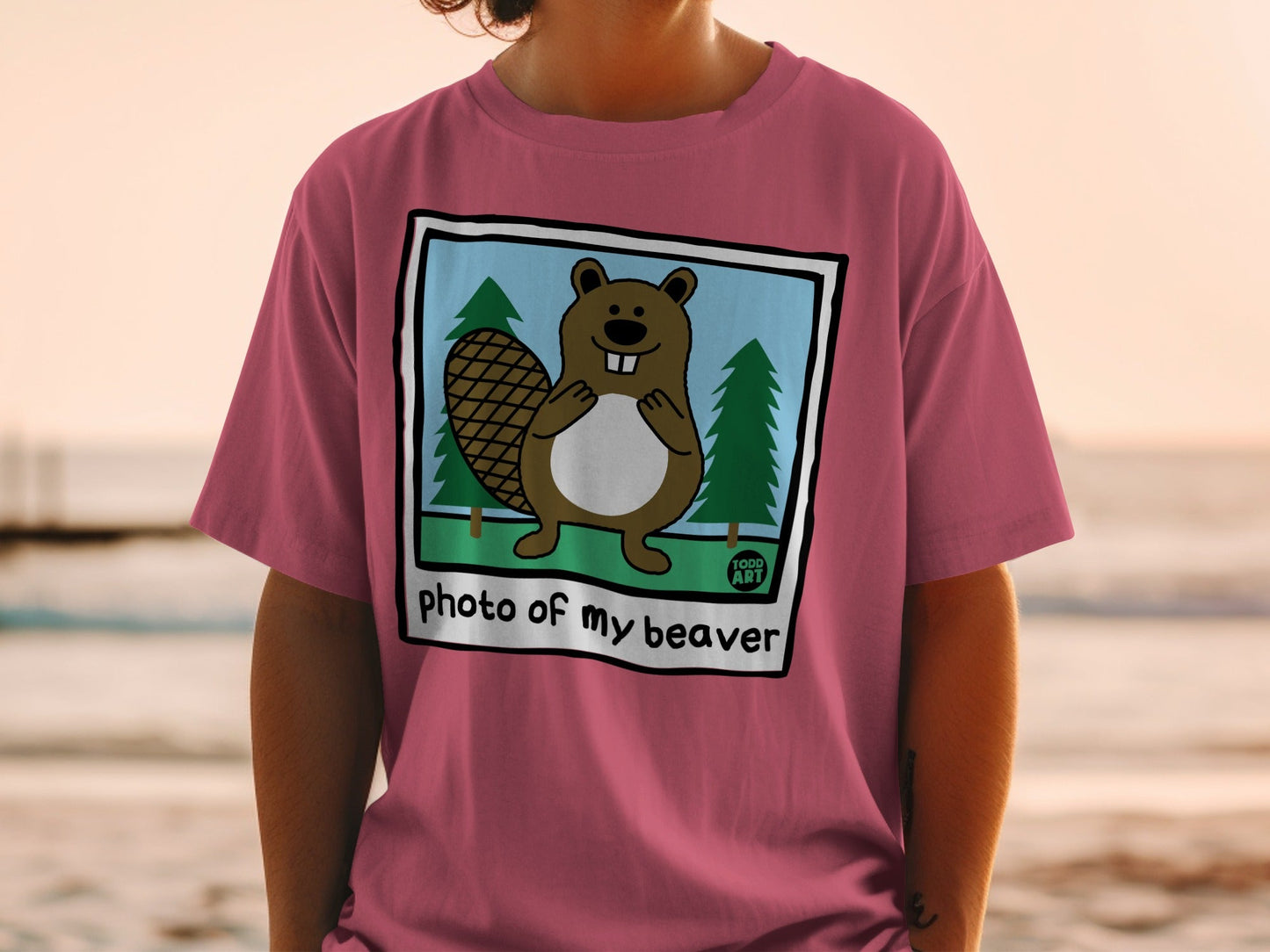 T-shirt featuring cartoon beaver and trees with text "photo of my beaver".