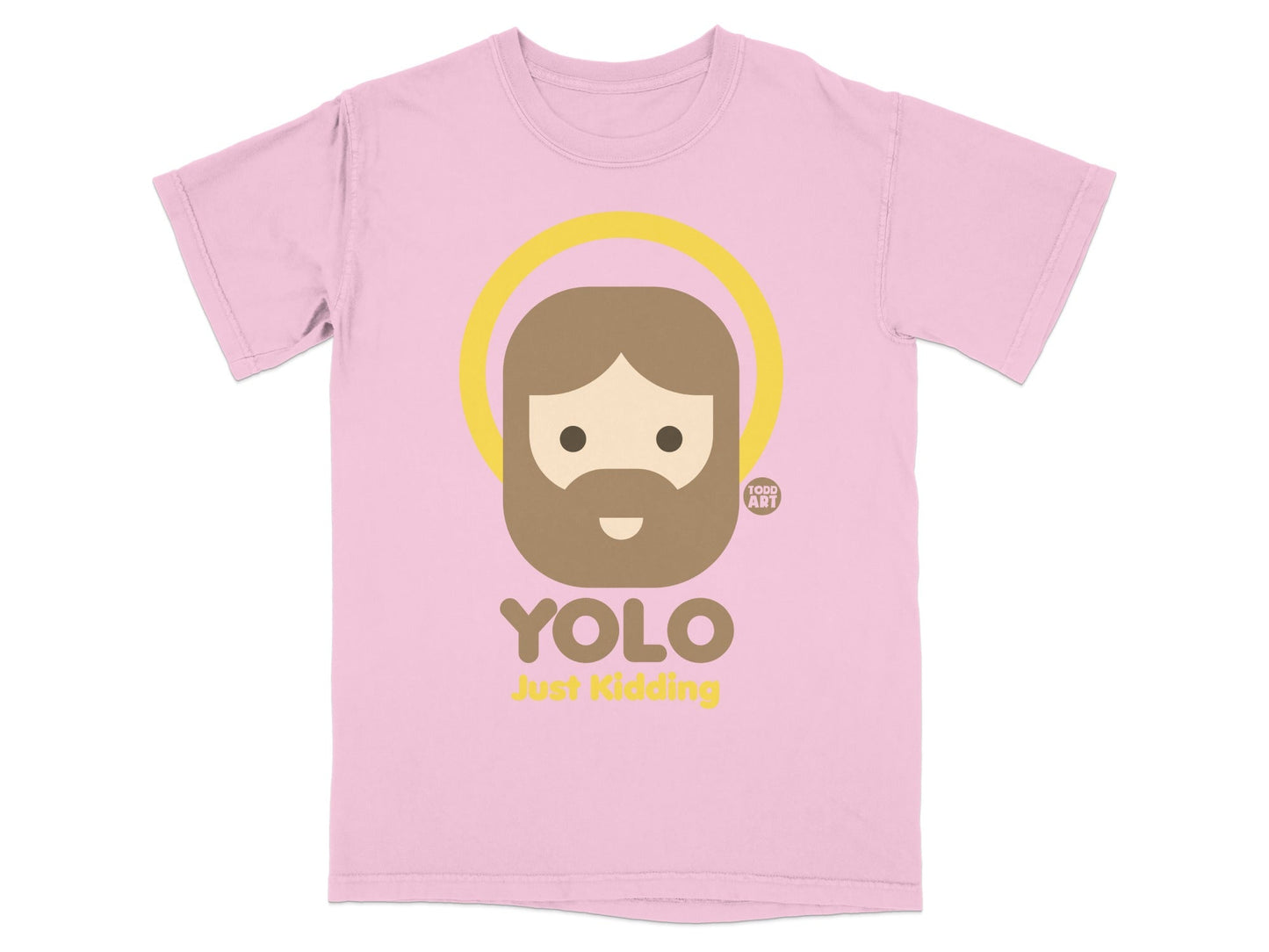 Pink t-shirt with a haloed cartoon face and "YOLO Just Kidding" text.