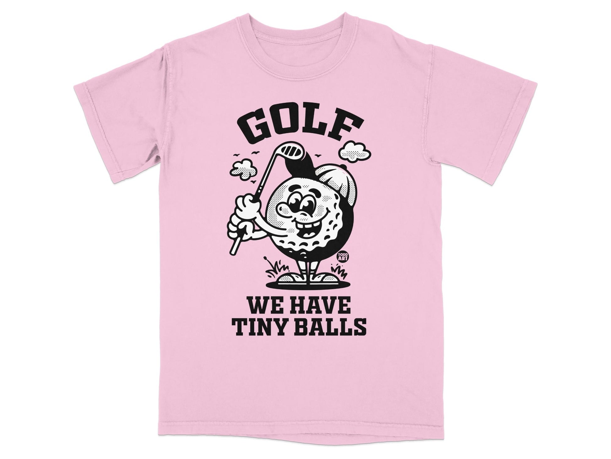 Pink t-shirt with cartoon golf ball character and text "GOLF WE HAVE TINY BALLS".