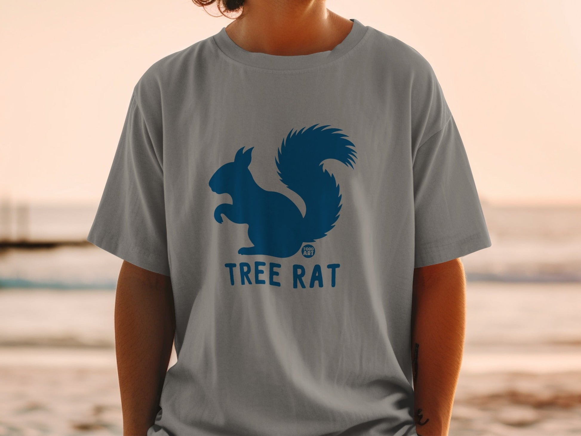 Grey t-shirt with a blue squirrel logo and "TREE RAT" text.