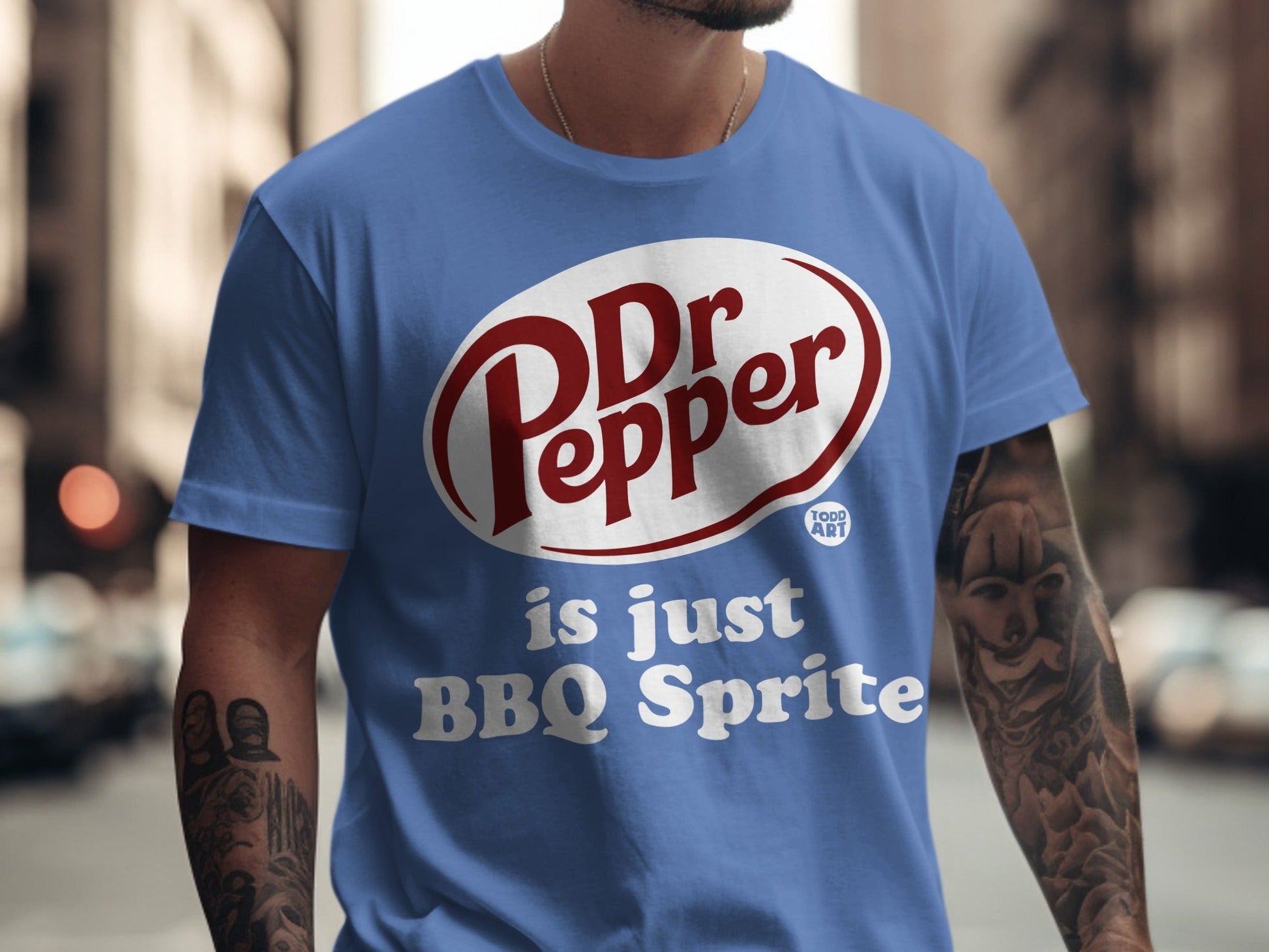 Blue t-shirt with Dr Pepper logo and "is just BBQ Sprite" text.