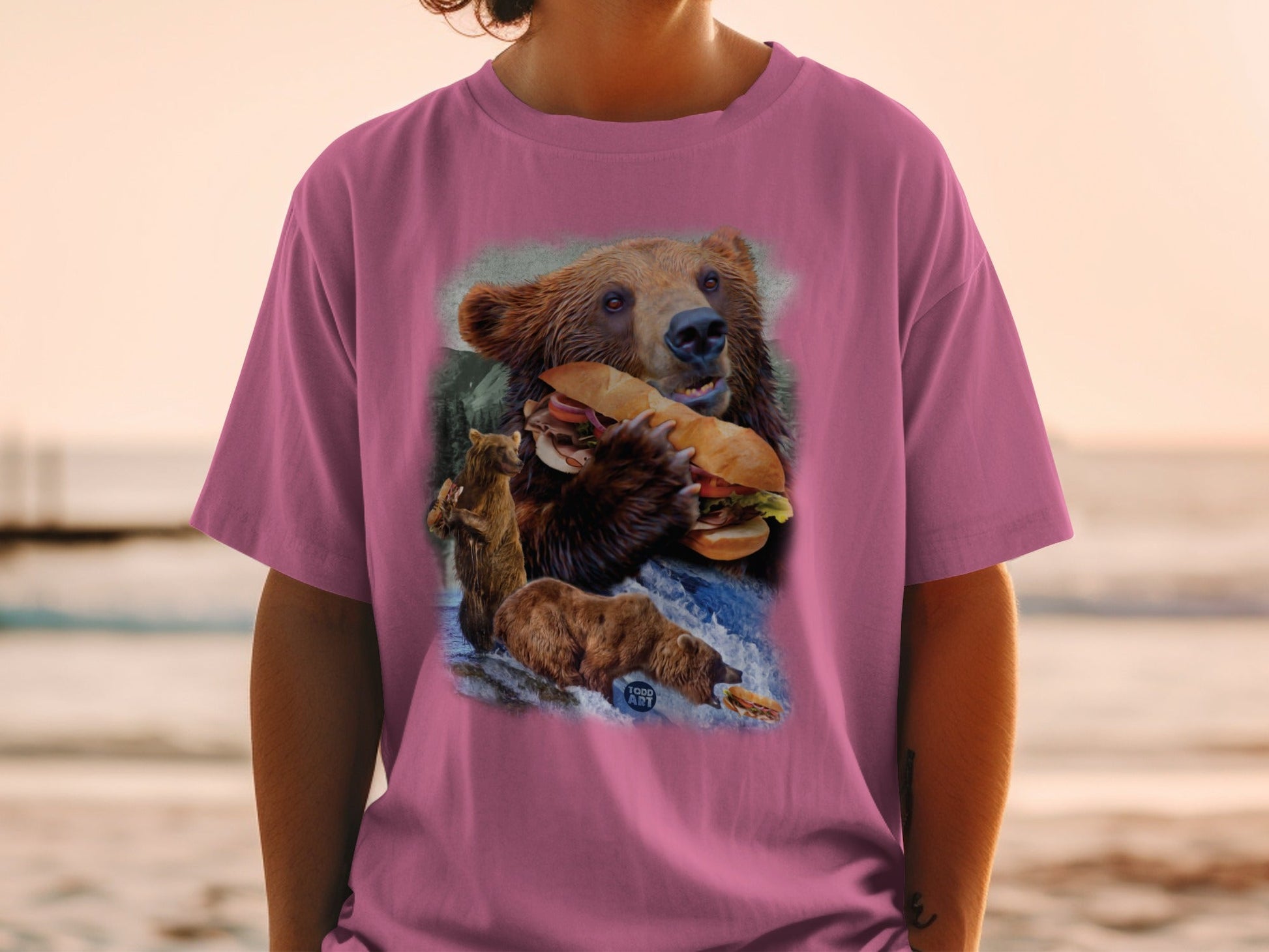 Grizzly Bear Eating Sandwich Scene on Pink Shirt