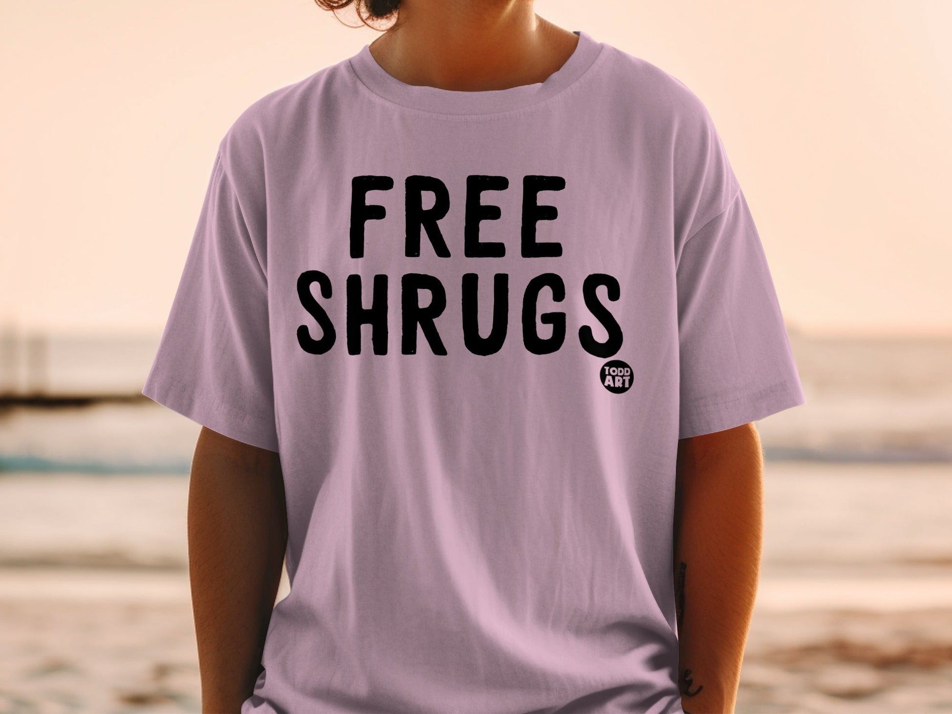 Free Shrugs Todd Art Graphic T-Shirt