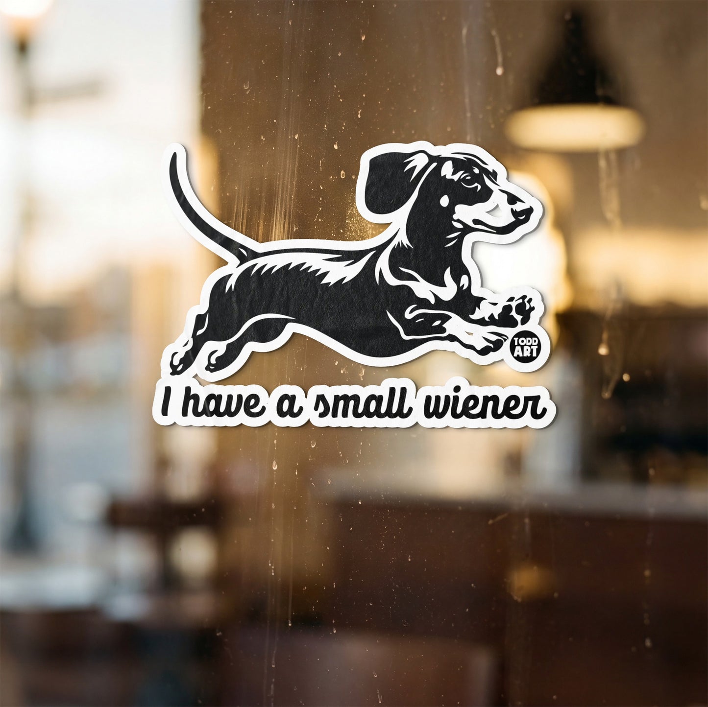 Black and white illustration of a jumping dachshund with text "I have a small wiener".