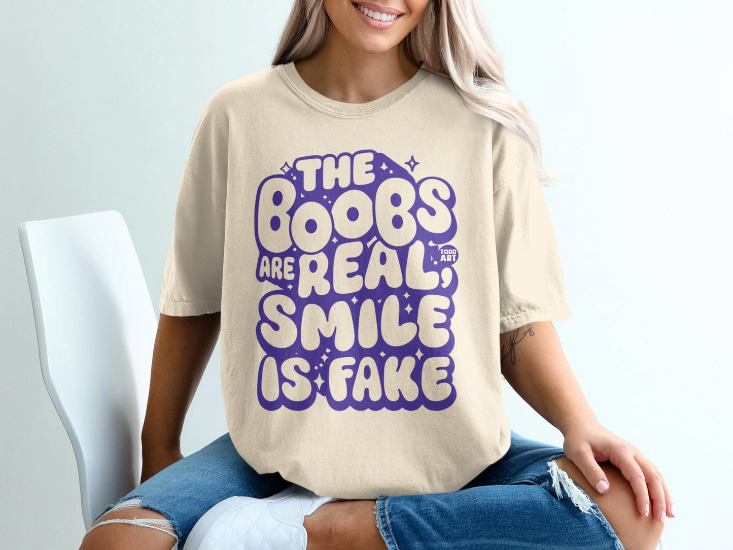 The Boobs Are Real Smile Is Fake Graphic Tee