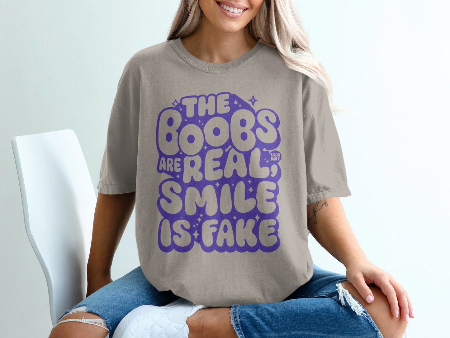 The Boobs Are Real Smile Is Fake Graphic Tee