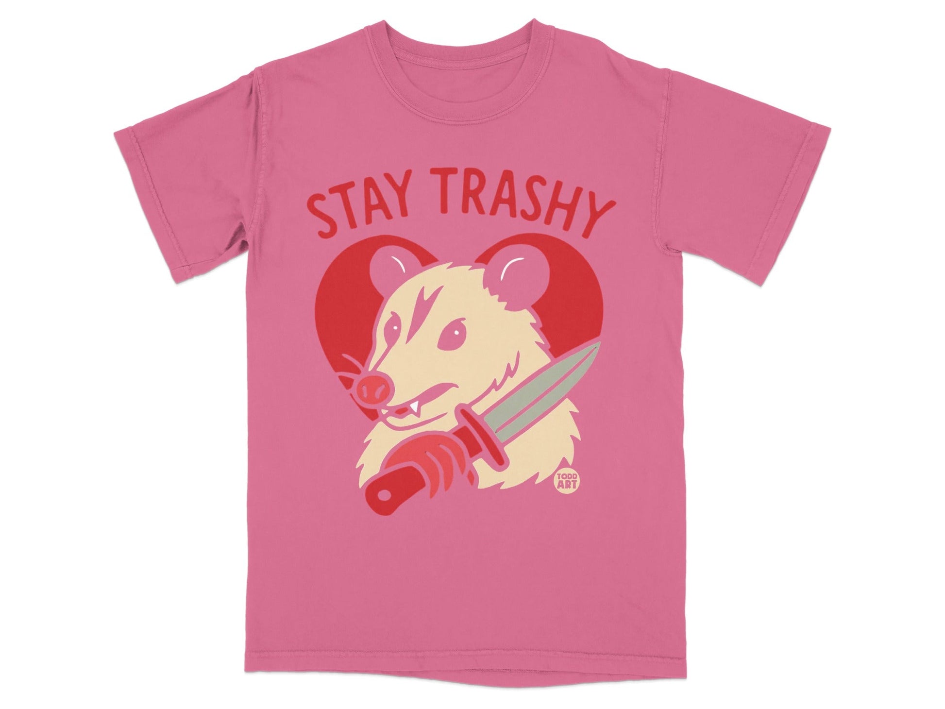 Pink t-shirt with "STAY TRASHY" and a possum holding a knife.