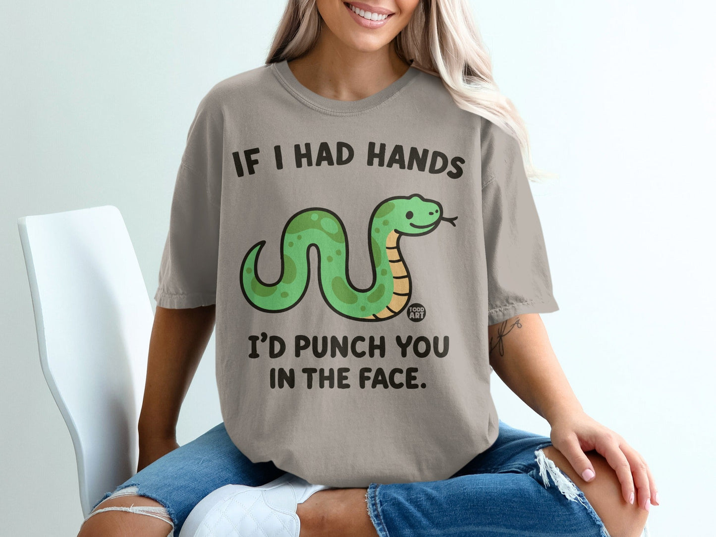 T-shirt with cartoon snake and text "If I had hands I'd punch you in the face."